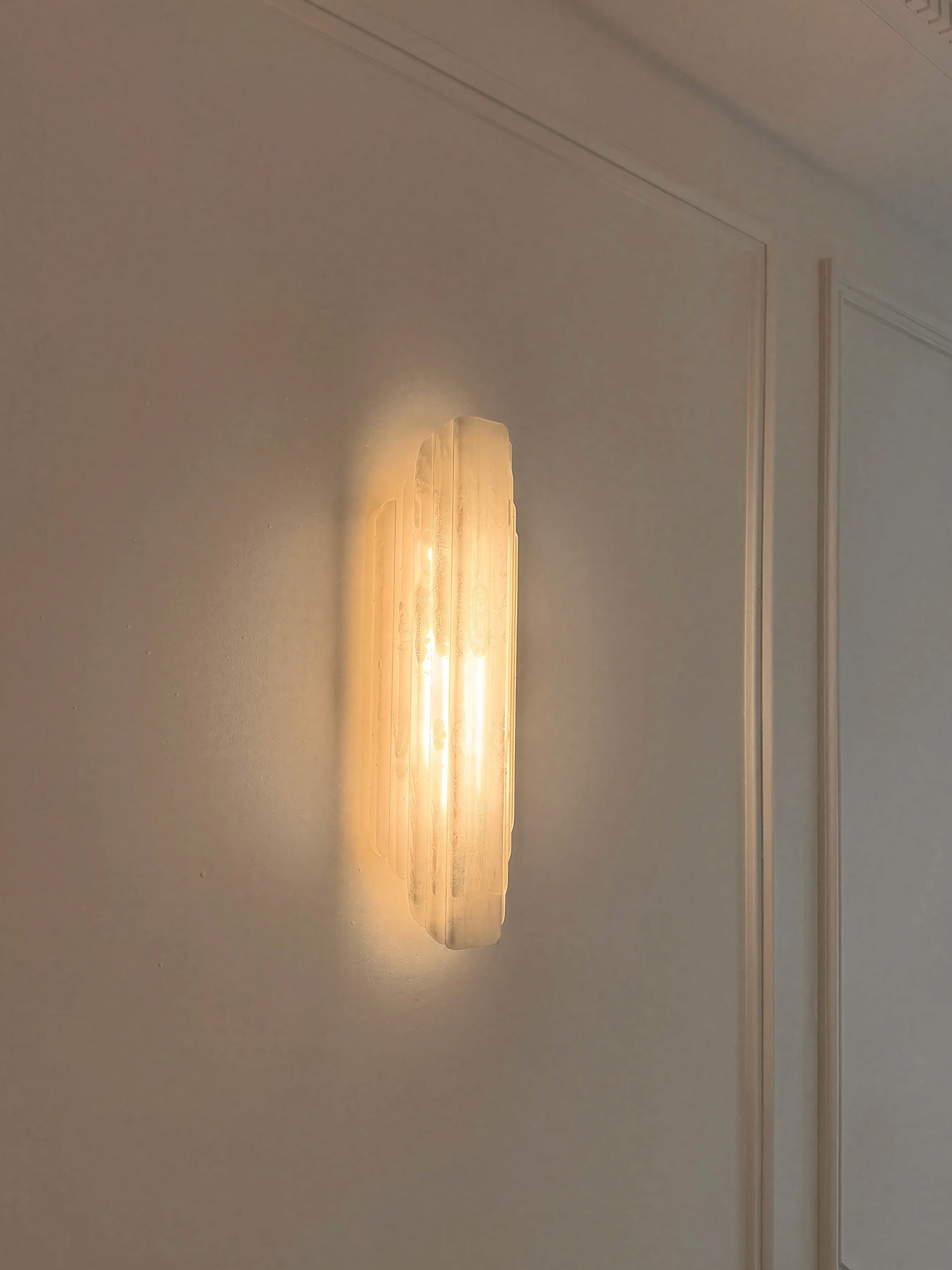 Feature wall light and decorative interior mouldings at Afton