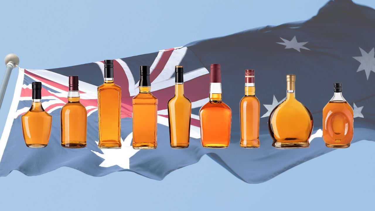 whisky bottles in front of australian flag spirits excise tax