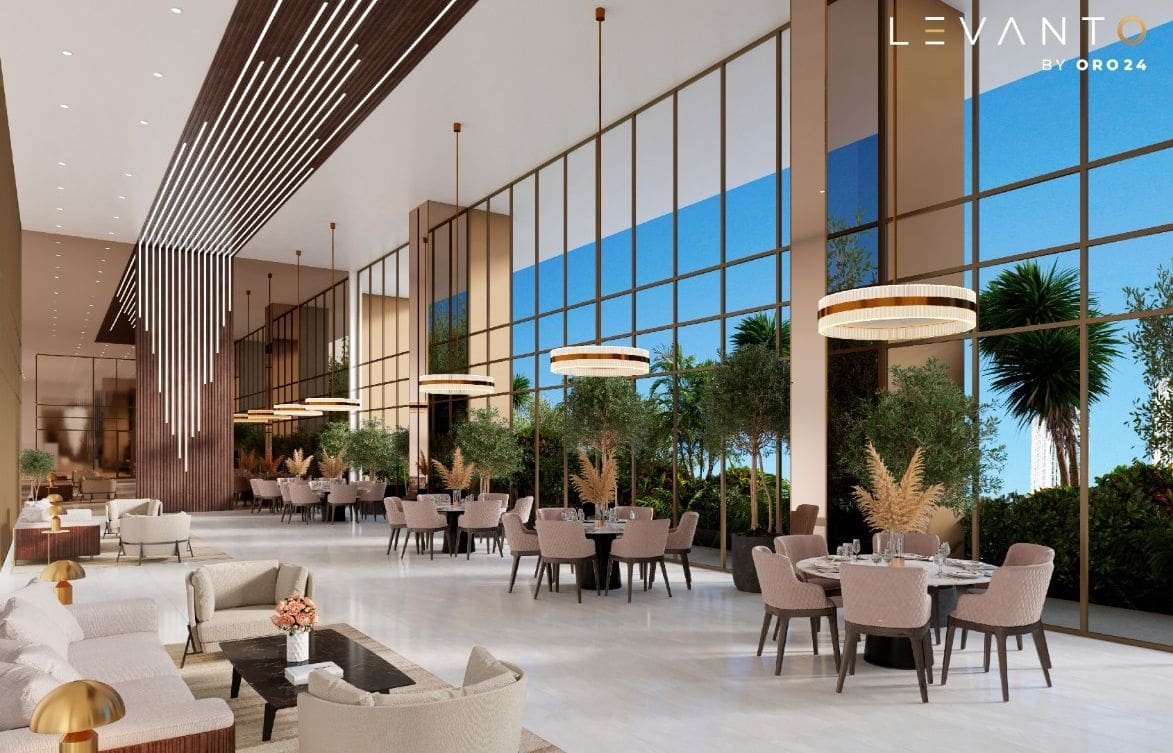 . Lobby of Levanto by ORO24 hotel featuring large windows that enhance the luxurious ambiance.