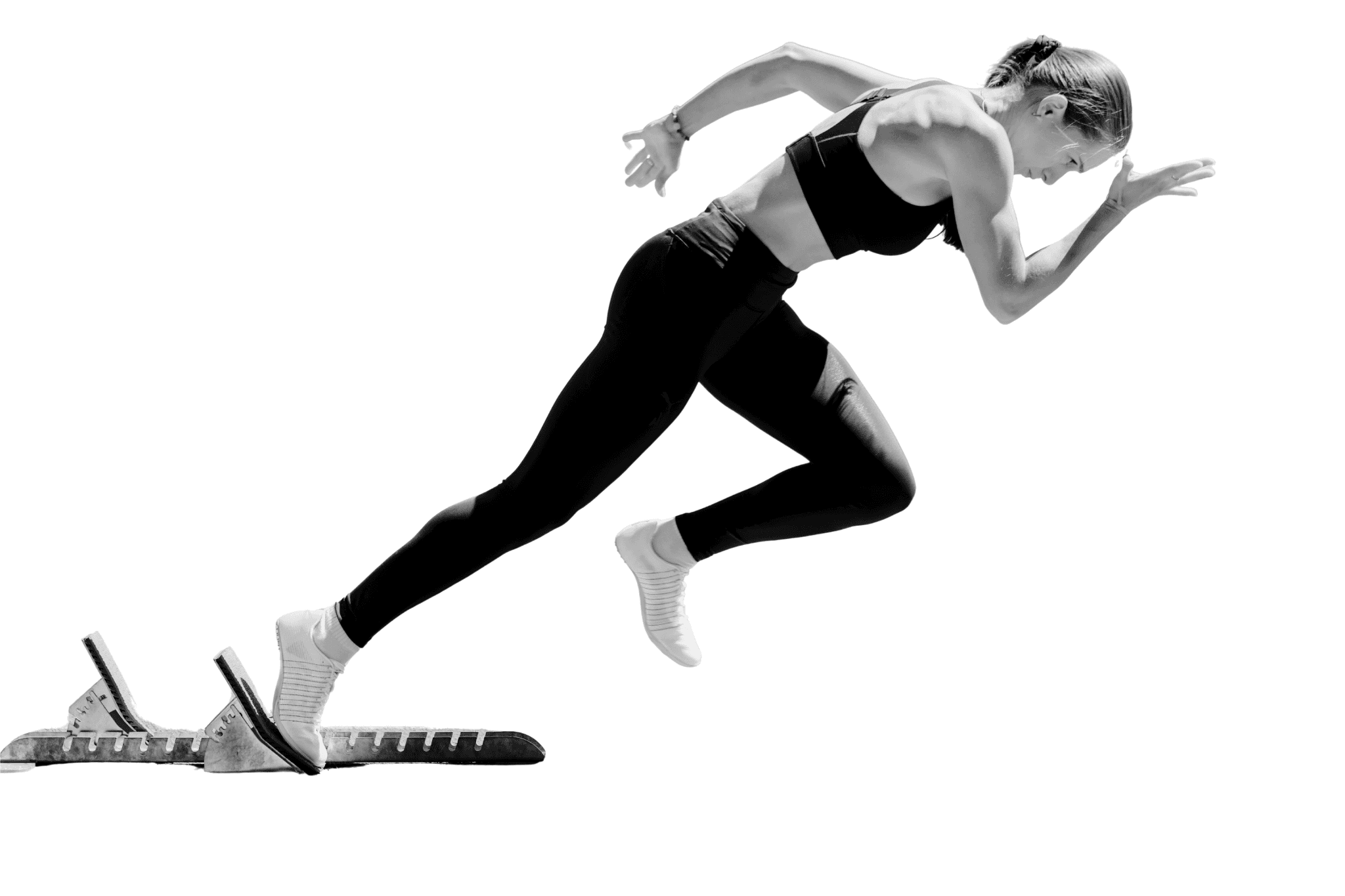 photo of female sprinter coming out of the blocks