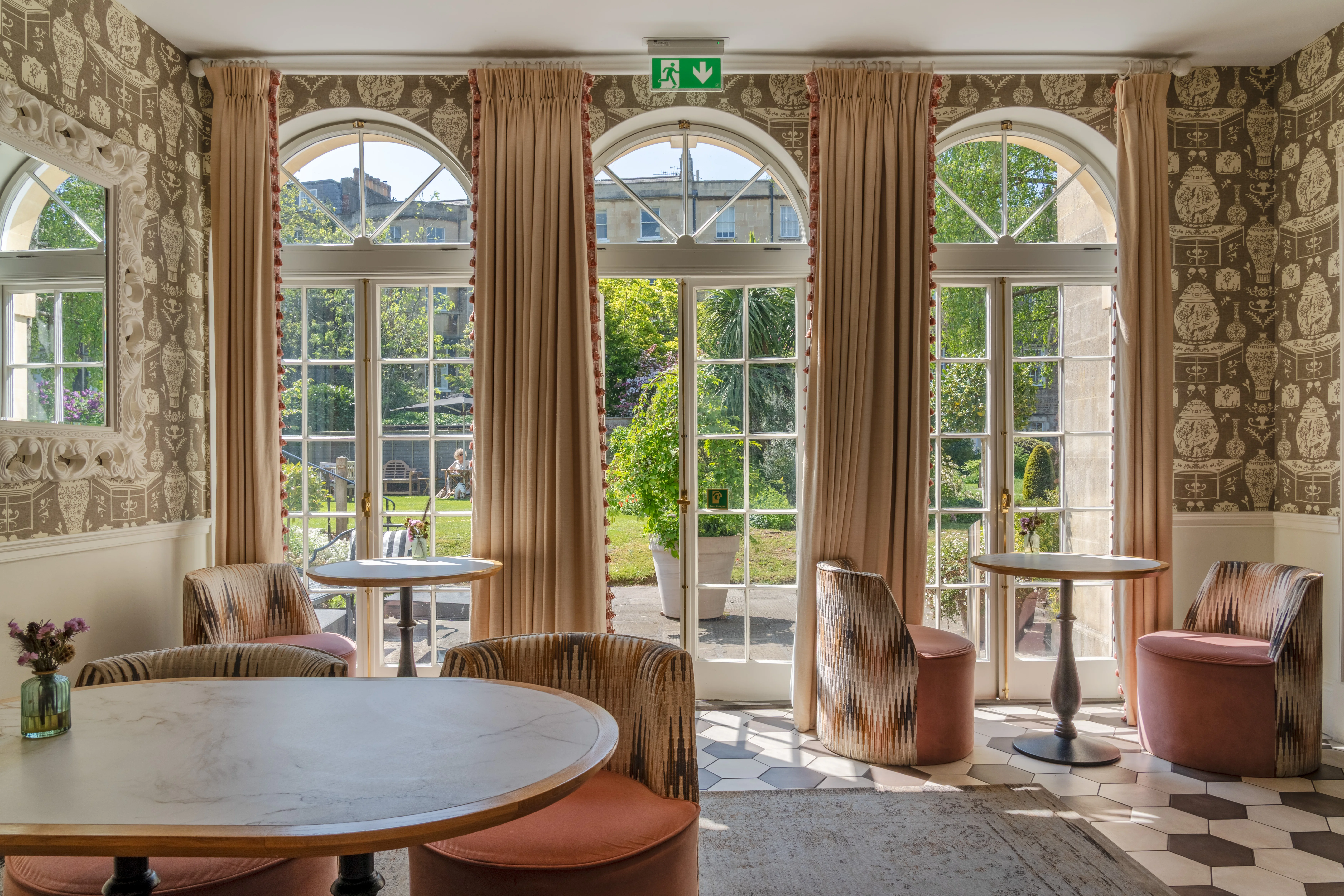 Hotel lounge with French doors opening onto gardens at Royal Crescent Hotel