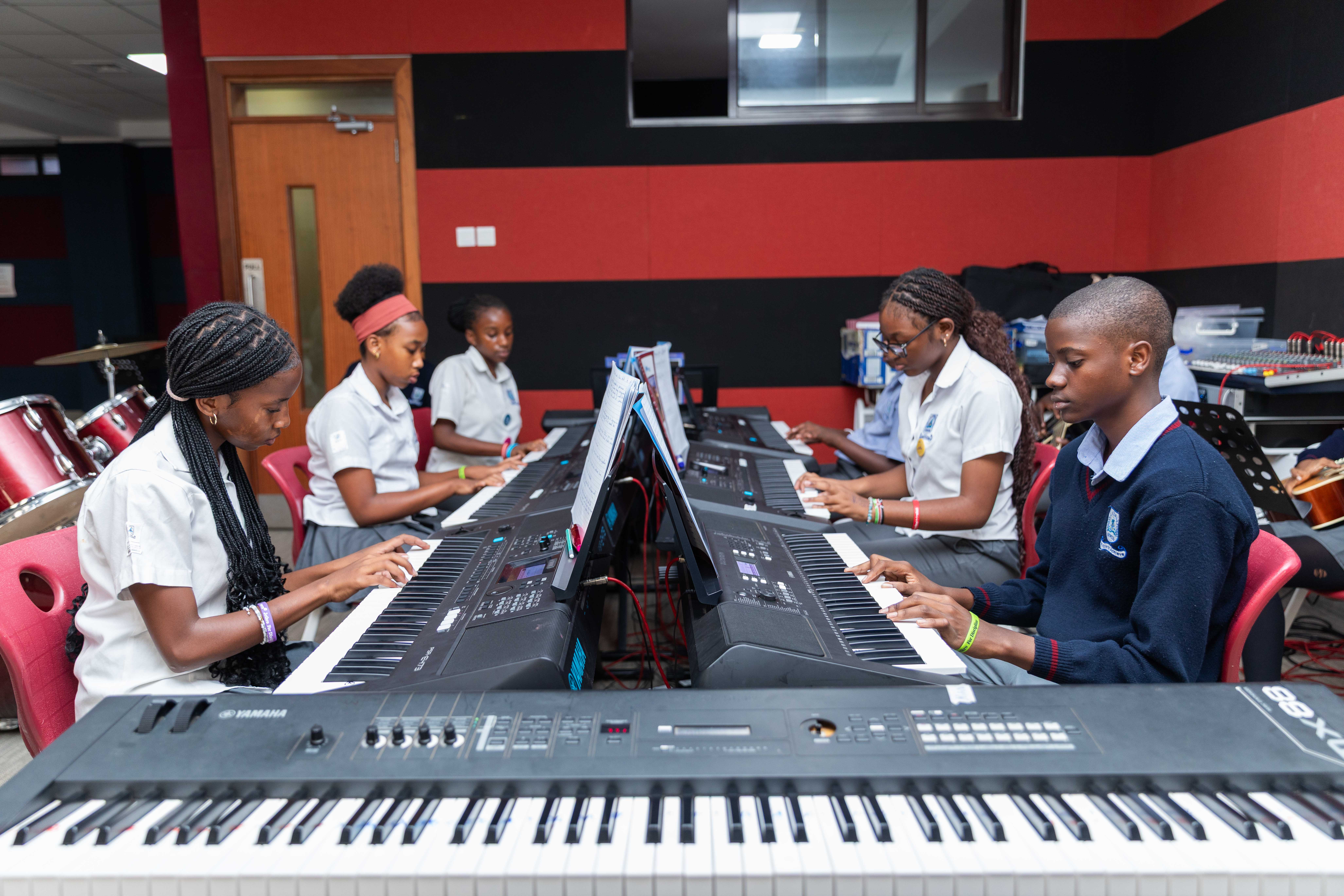A student stands with a backpack on, ready for school