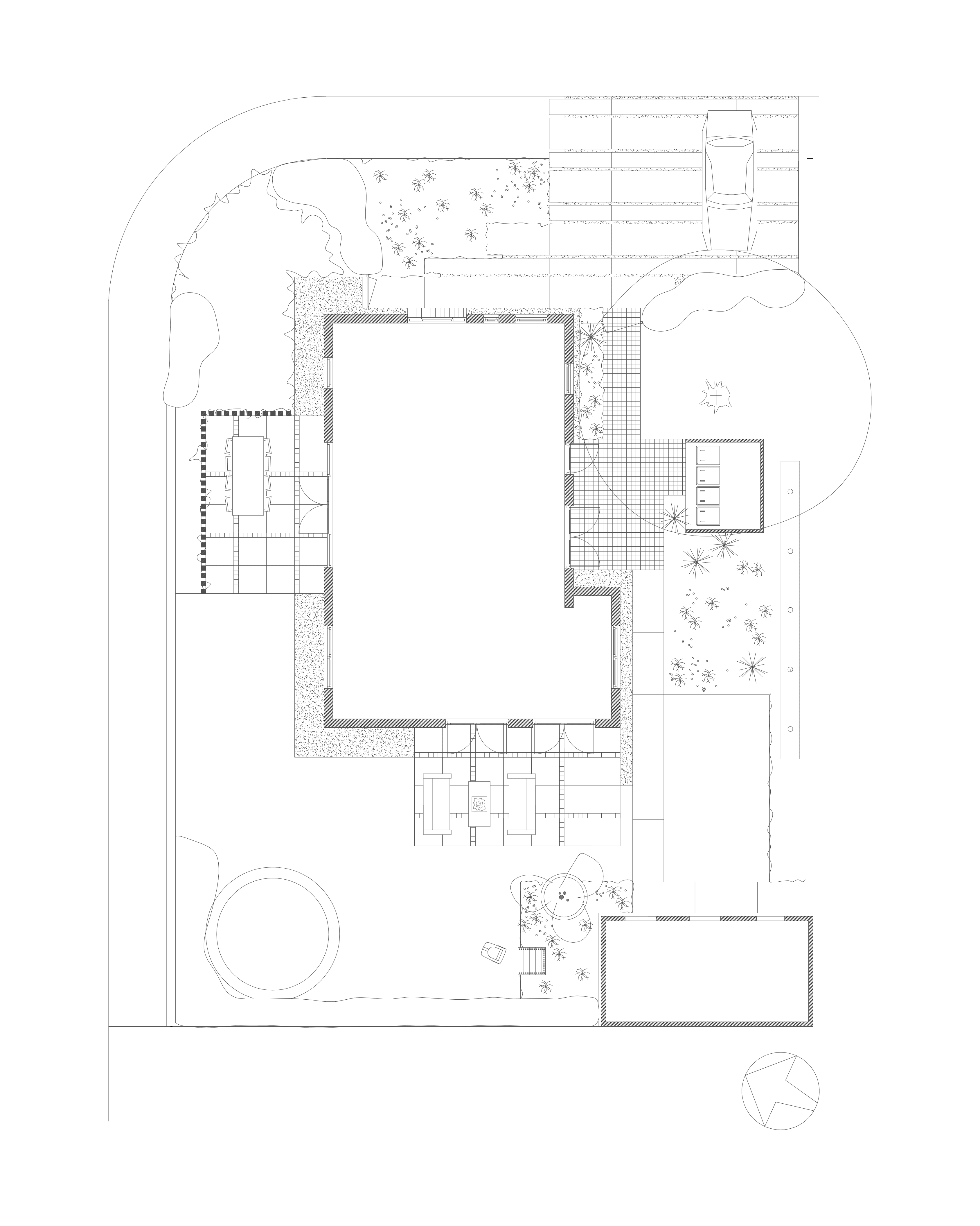 A modern house with large windows and a flat roof, surrounded by greenery against a clear blue sky.