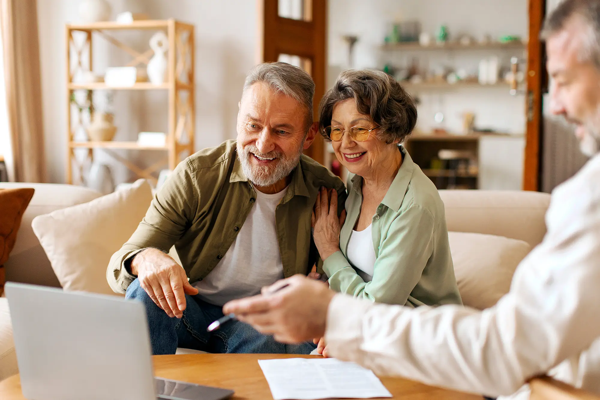 Older couple reviewing financial documents together