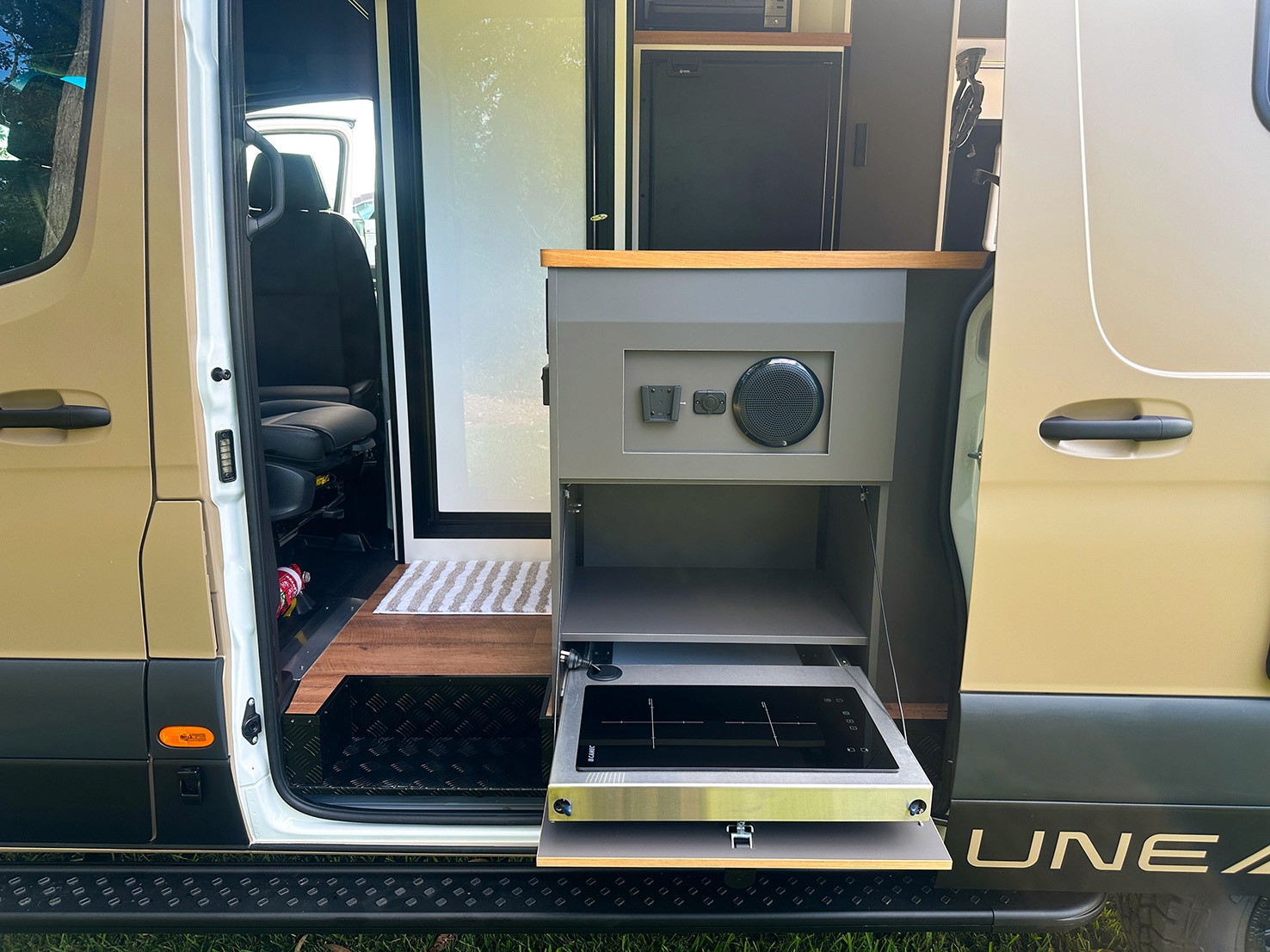 Campervan side entry with induction on slide out