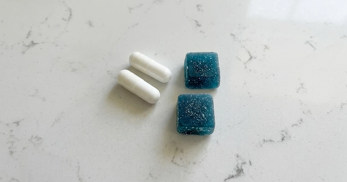 A selection of magnesium supplements in different forms on a kitchen counter.