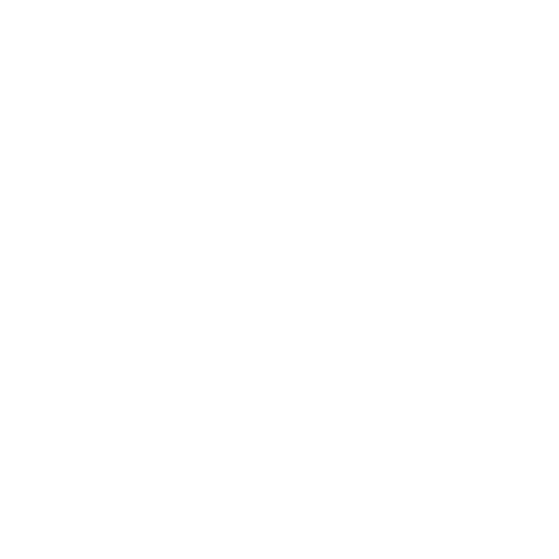 man smiling and using MacBook