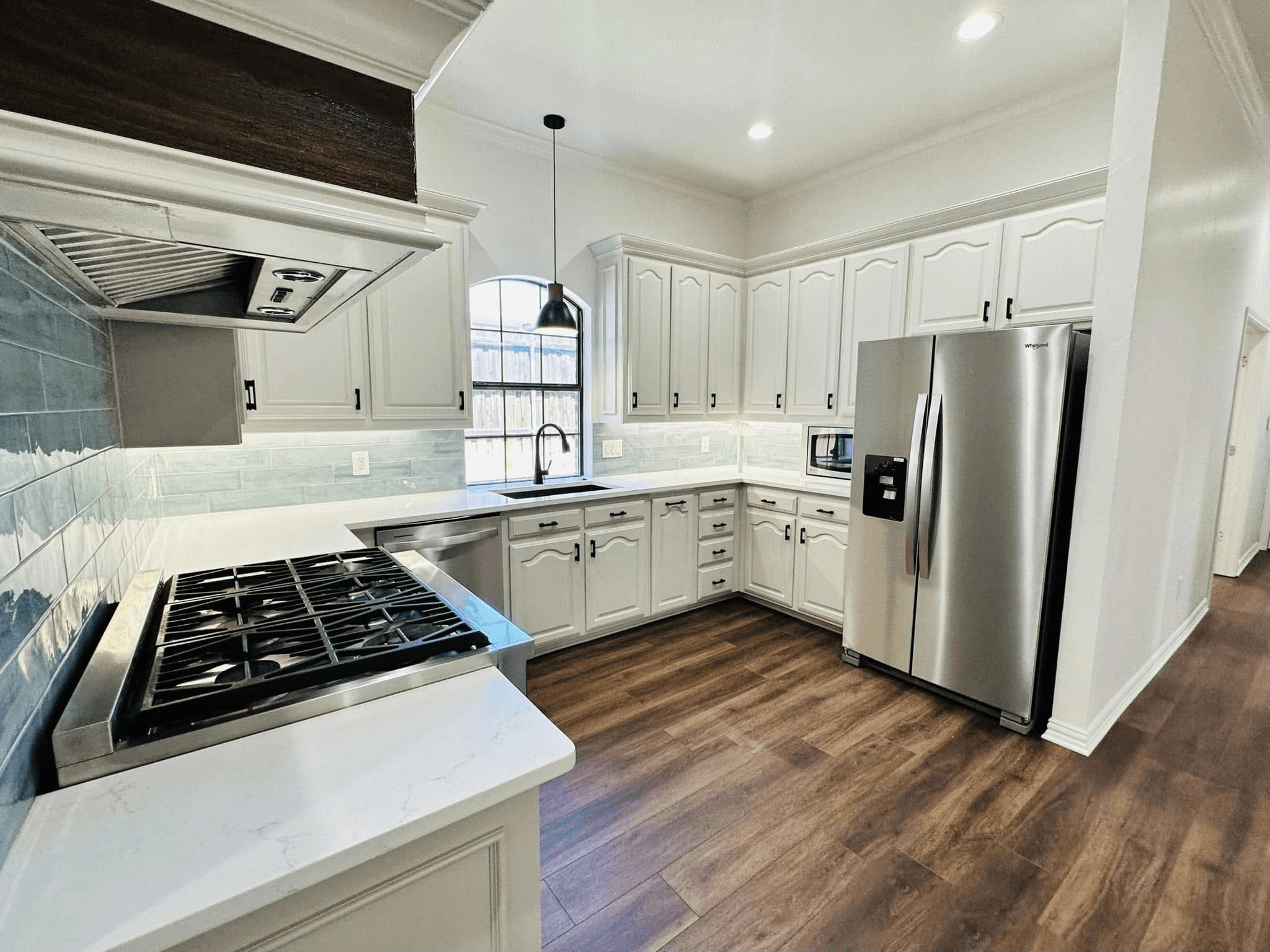 Functional kitchen layout designed for cooking and gathering