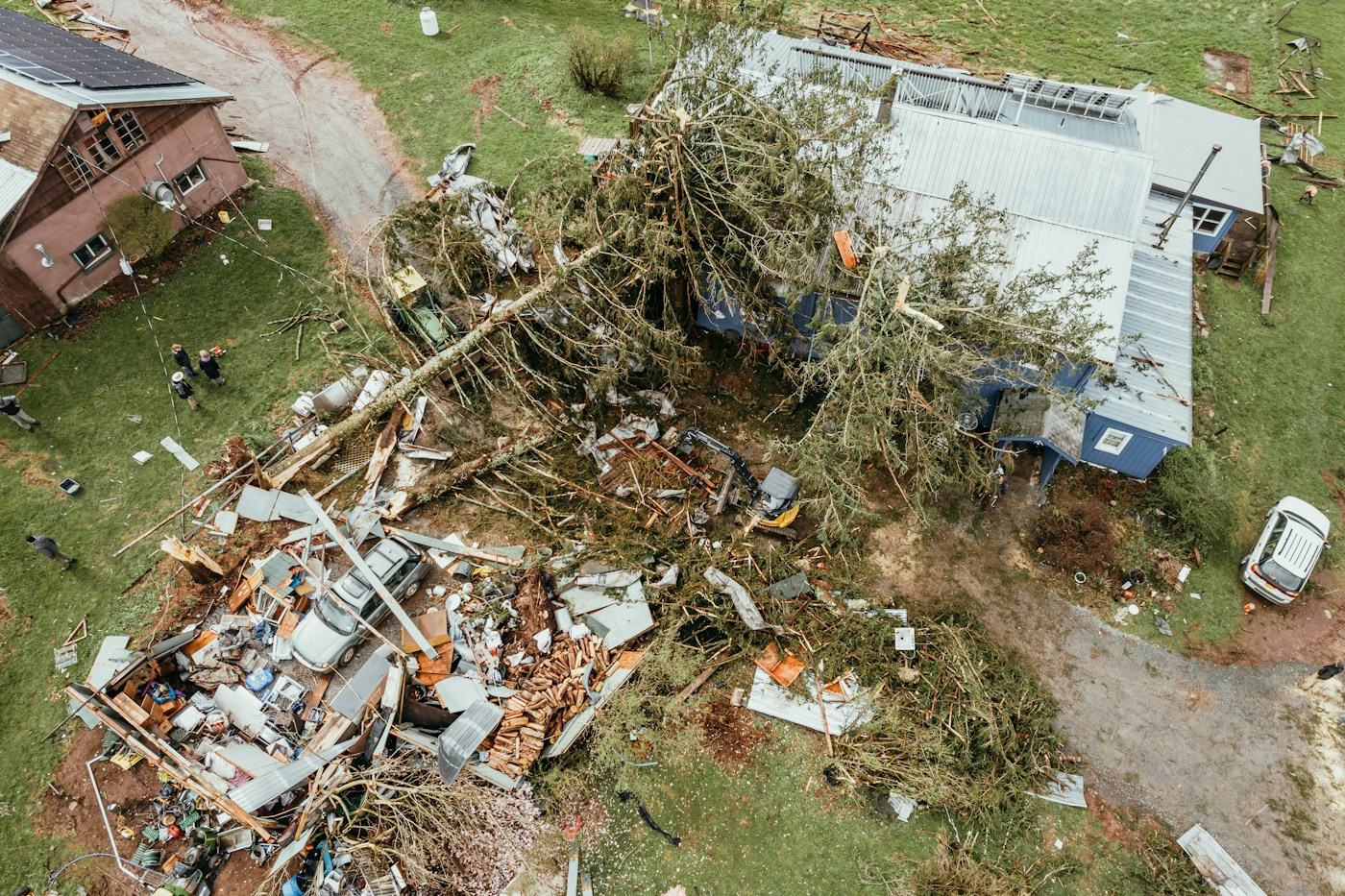 Aerial view of a storm-damaged home
