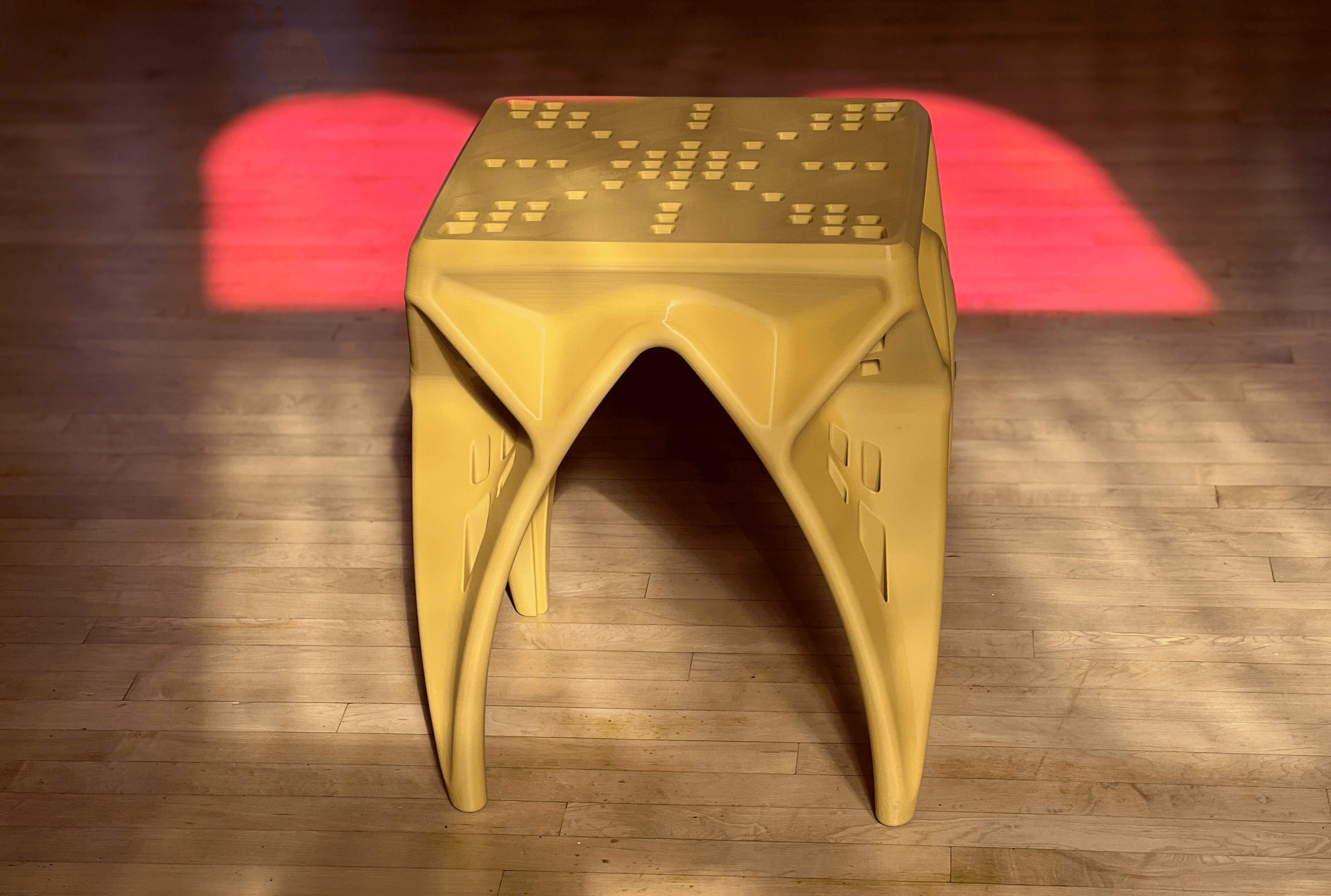 CAVITY 3D-printed stool and side table styled in a living room