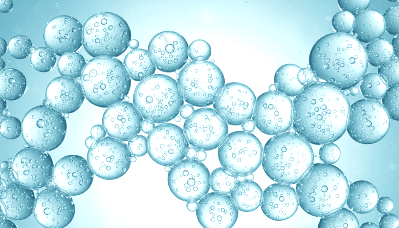 Close beauty portrait of two women with freckles and bold red lipstick in soft natural light.
