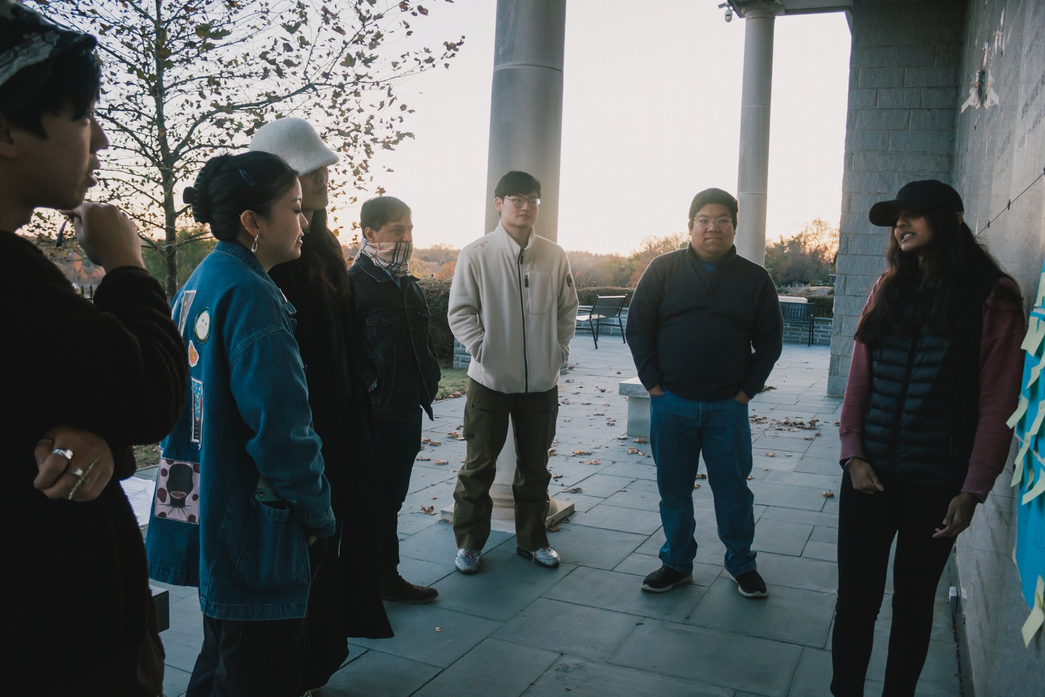 Group of Asian in a circle listening