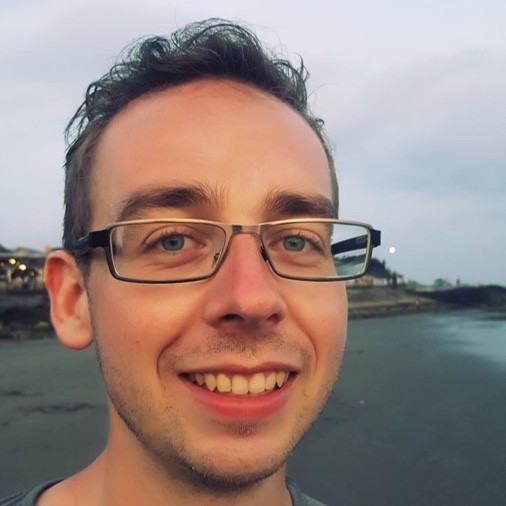 a man talking on a cell phone