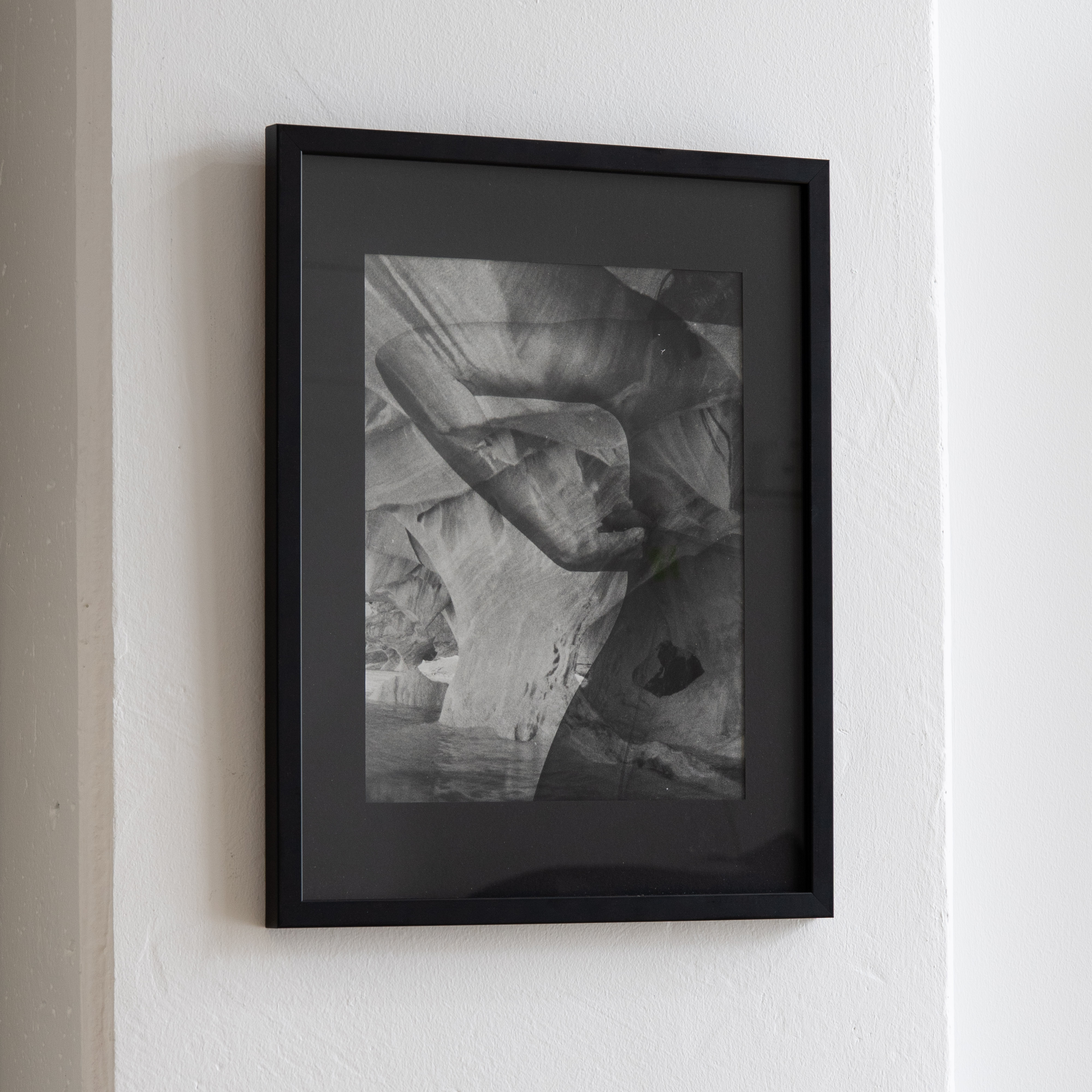 Darkroom prints drying on wire racks