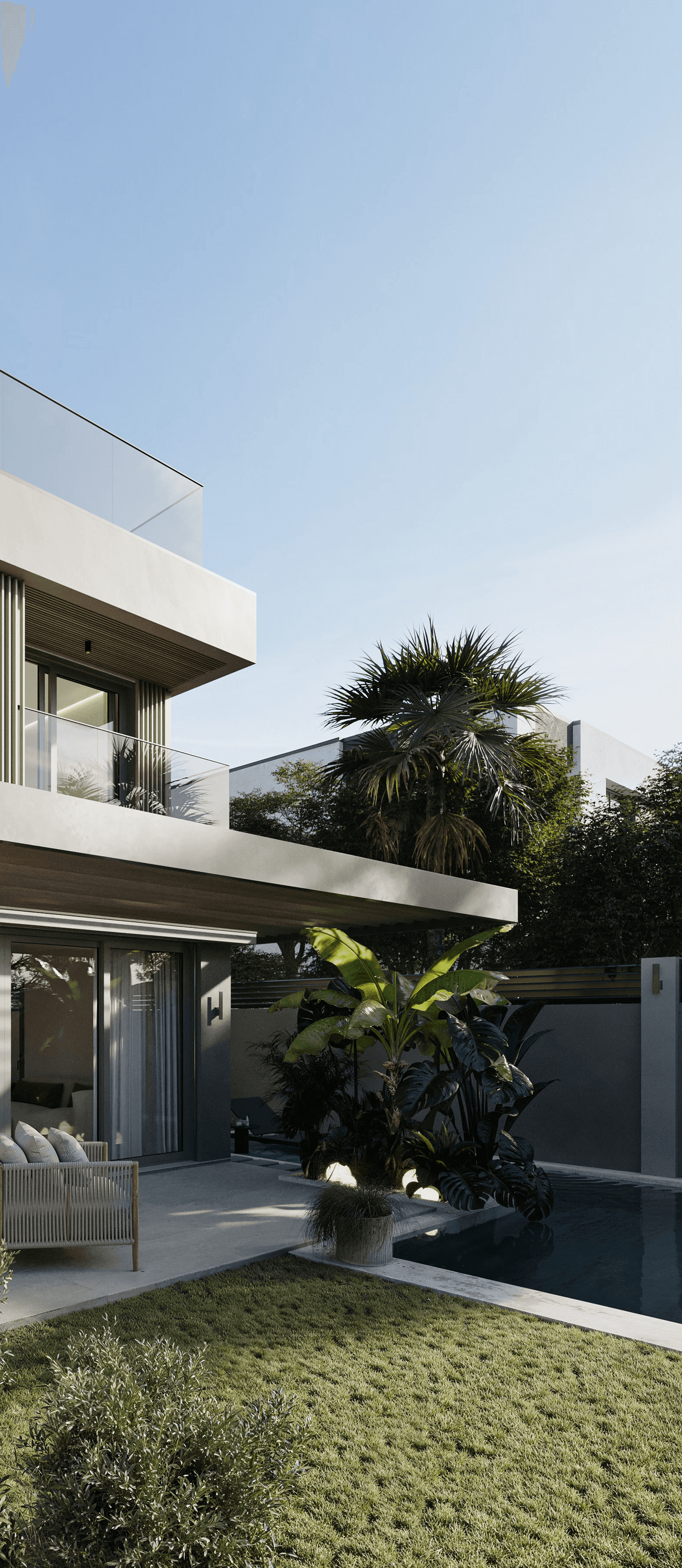 Woman in a light suit sitting thoughtfully against a terracotta wall