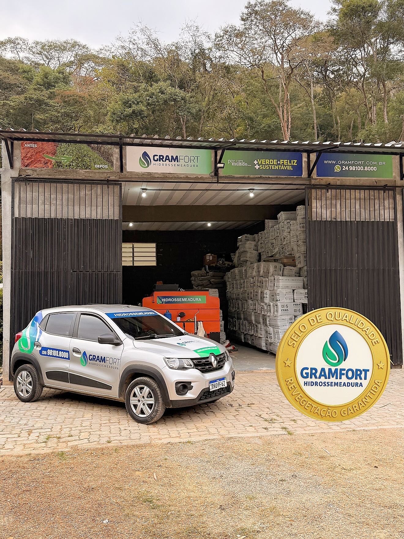 two ladies looking at a laptop and smiling