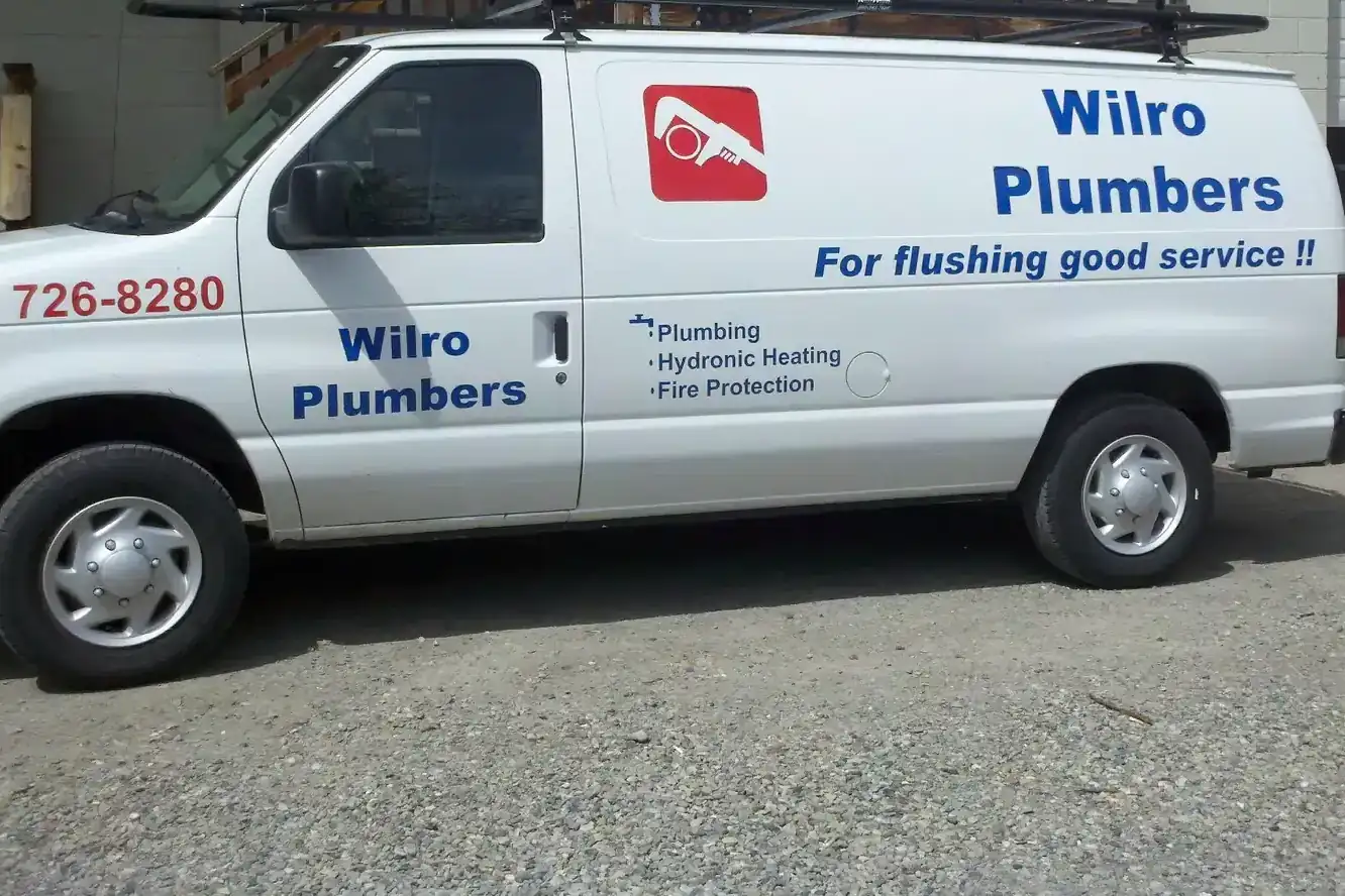 Wilro Plumbers service van parked outside the shop on Highway 75, Ketchum