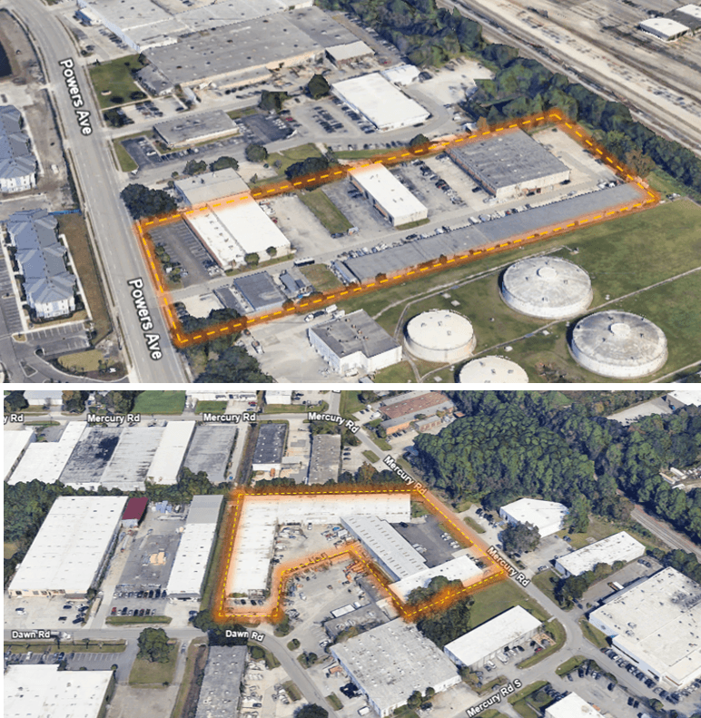 Tall modern skyscraper with vertical lines, viewed against a clear blue sky.