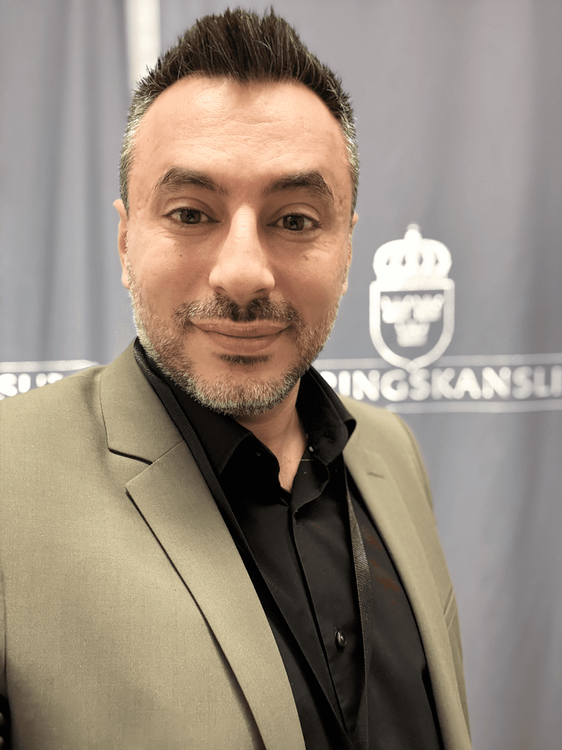 man wearing white V-neck shirt