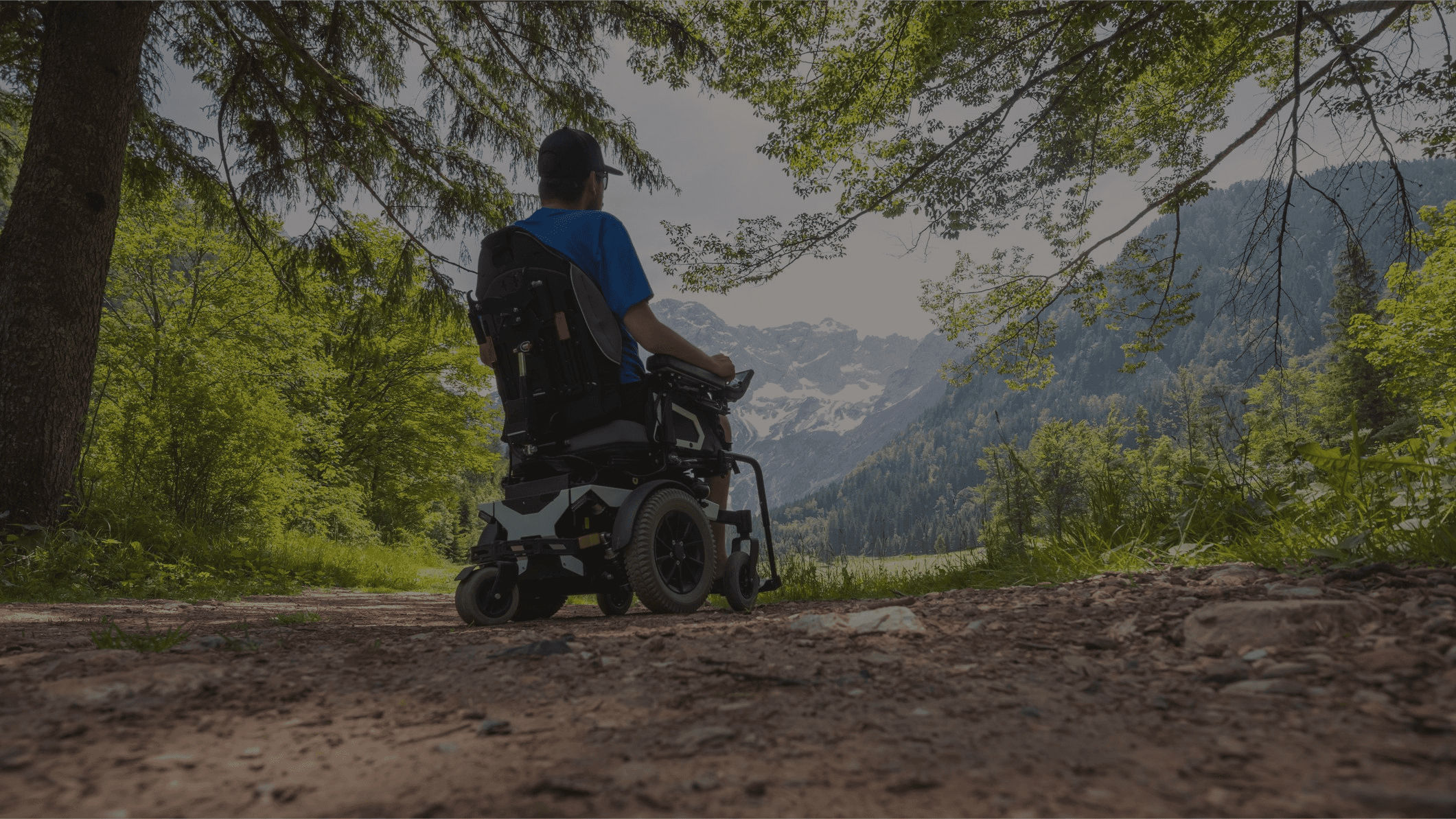 A man on a wheelchair in nature