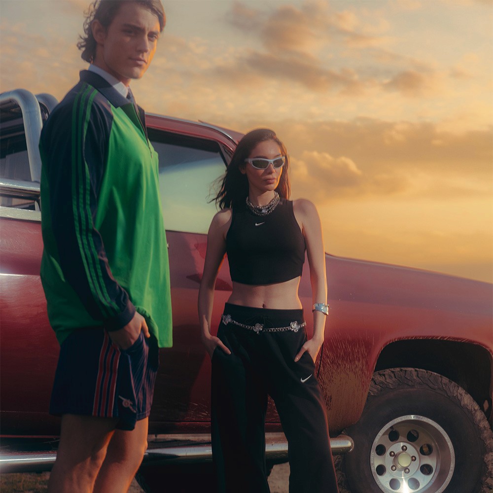 Streetside billboard with flyposters of the Batch.Works brand and illustrations