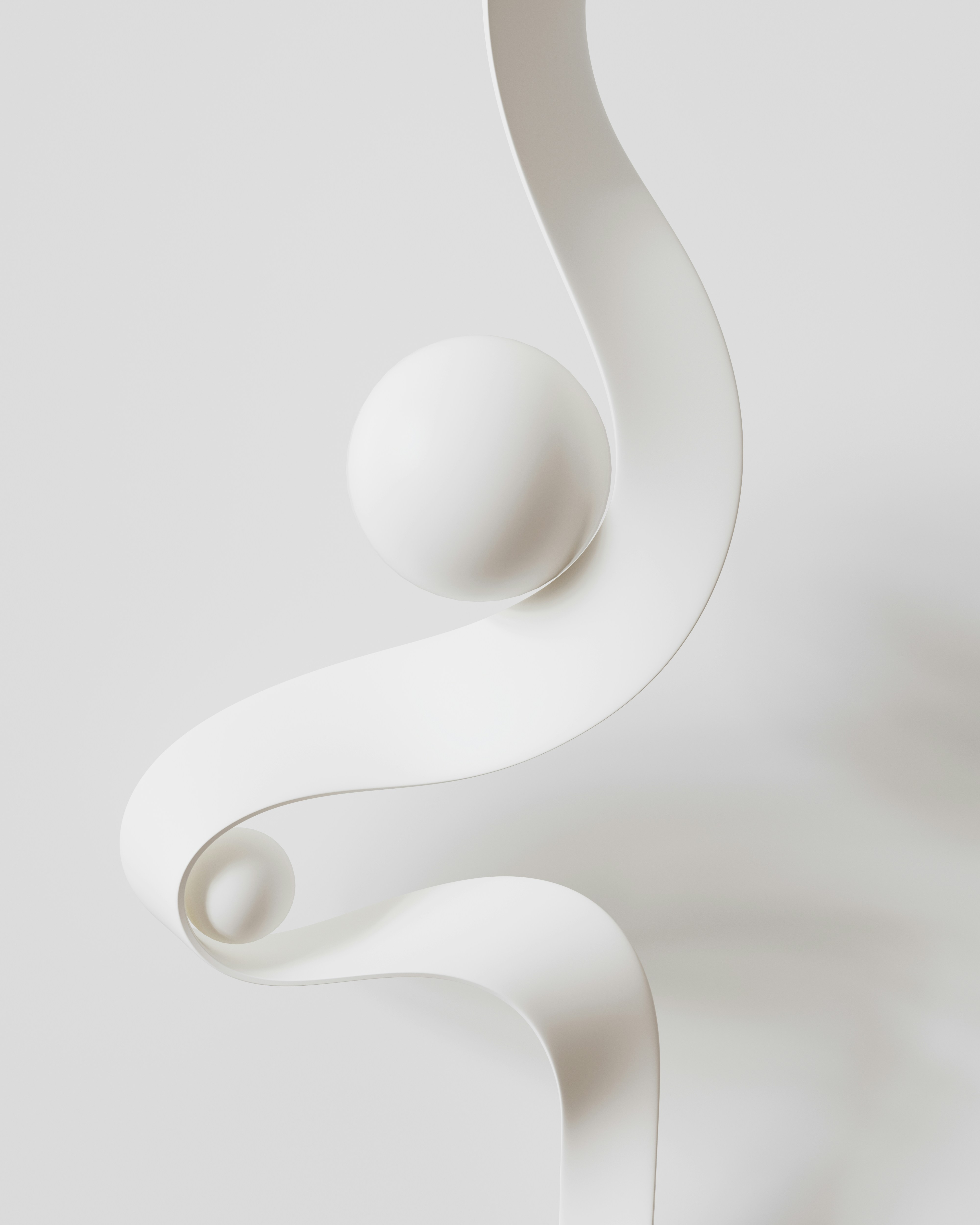 A white sculpture is shown against a white background
