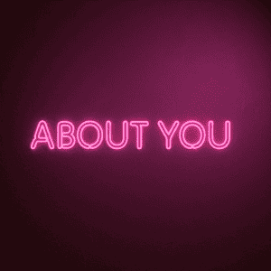 Neon sign saying ABOUT YOU