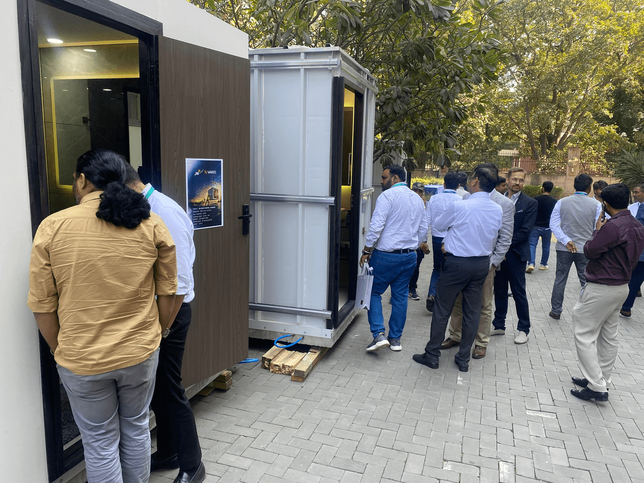 A photo of Precast Academy visitors checking out the VAKIO Pods.