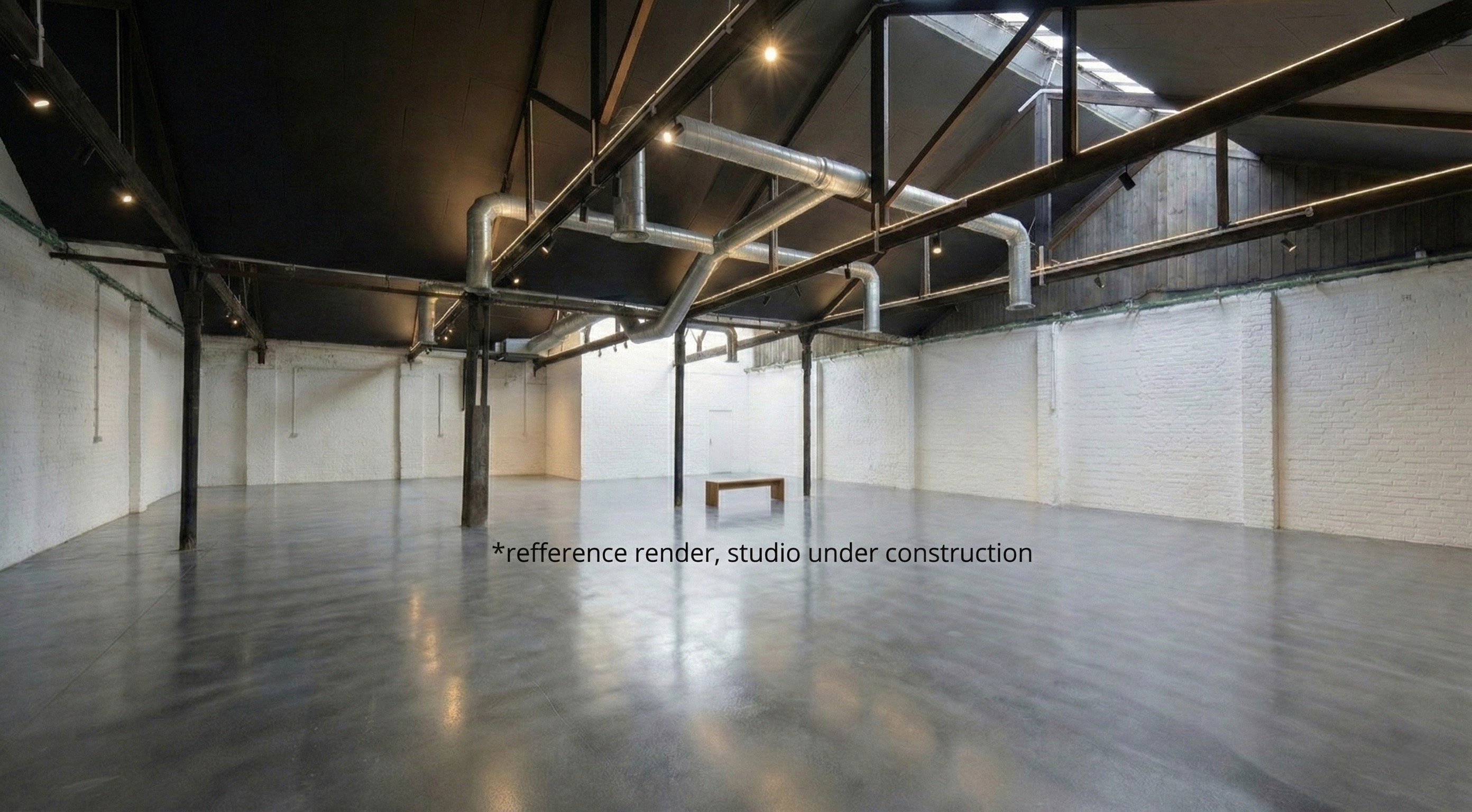 Close-up profile of a young person with curly hair in a hoodie looking up at a bright sky.