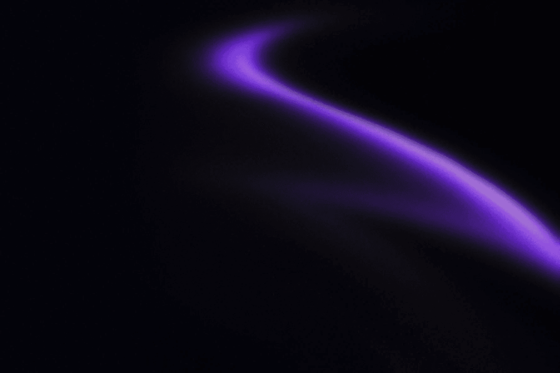 Florist separating a leaf from the stem of a flower