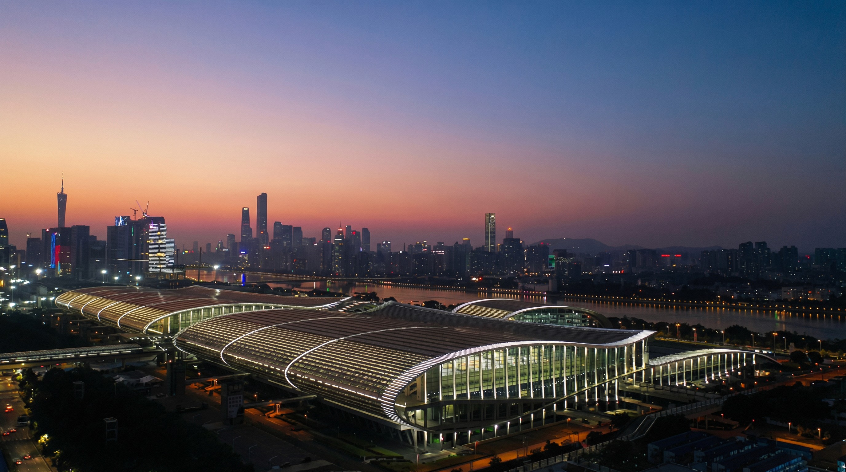 Wide desert landscape with cliffs and open sky.