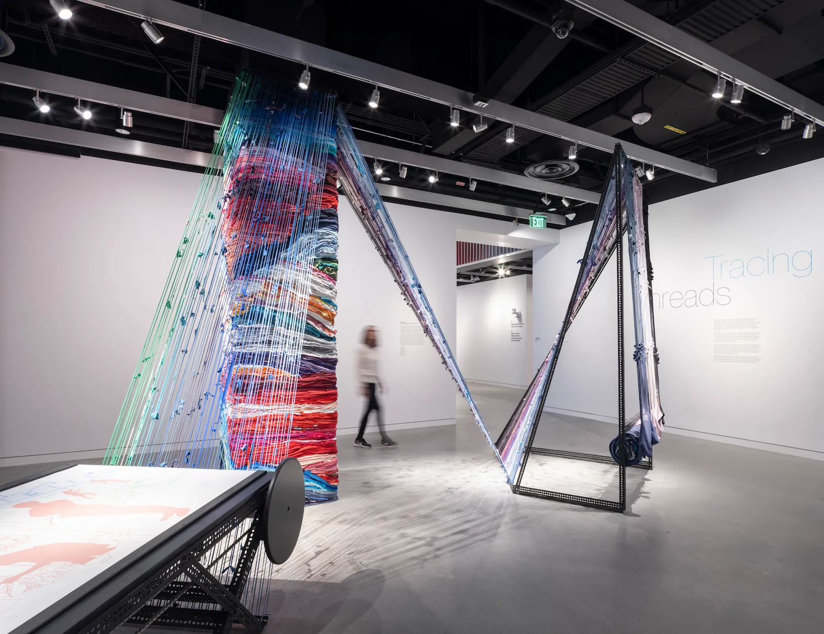 Coring America art exhibit of recycled T-shirts in museum exhibition space