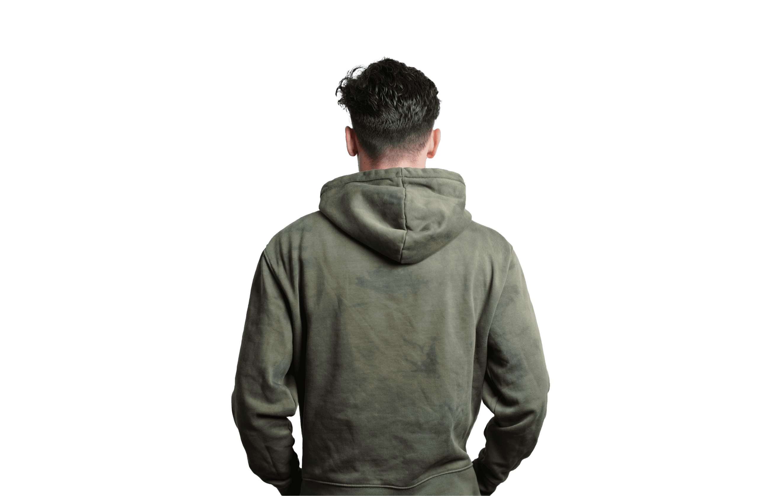 A portrait of Adam Sinda, a product designer, seated and looking thoughtfully off to the side. He is in a casual pose with his hands clasped, wearing a dark polo shirt. The background is a warm, neutral tone, and his name is repeated in large white letters, emphasizing his personal brand. Below his name, text states his occupation and his current position at Whatnot.