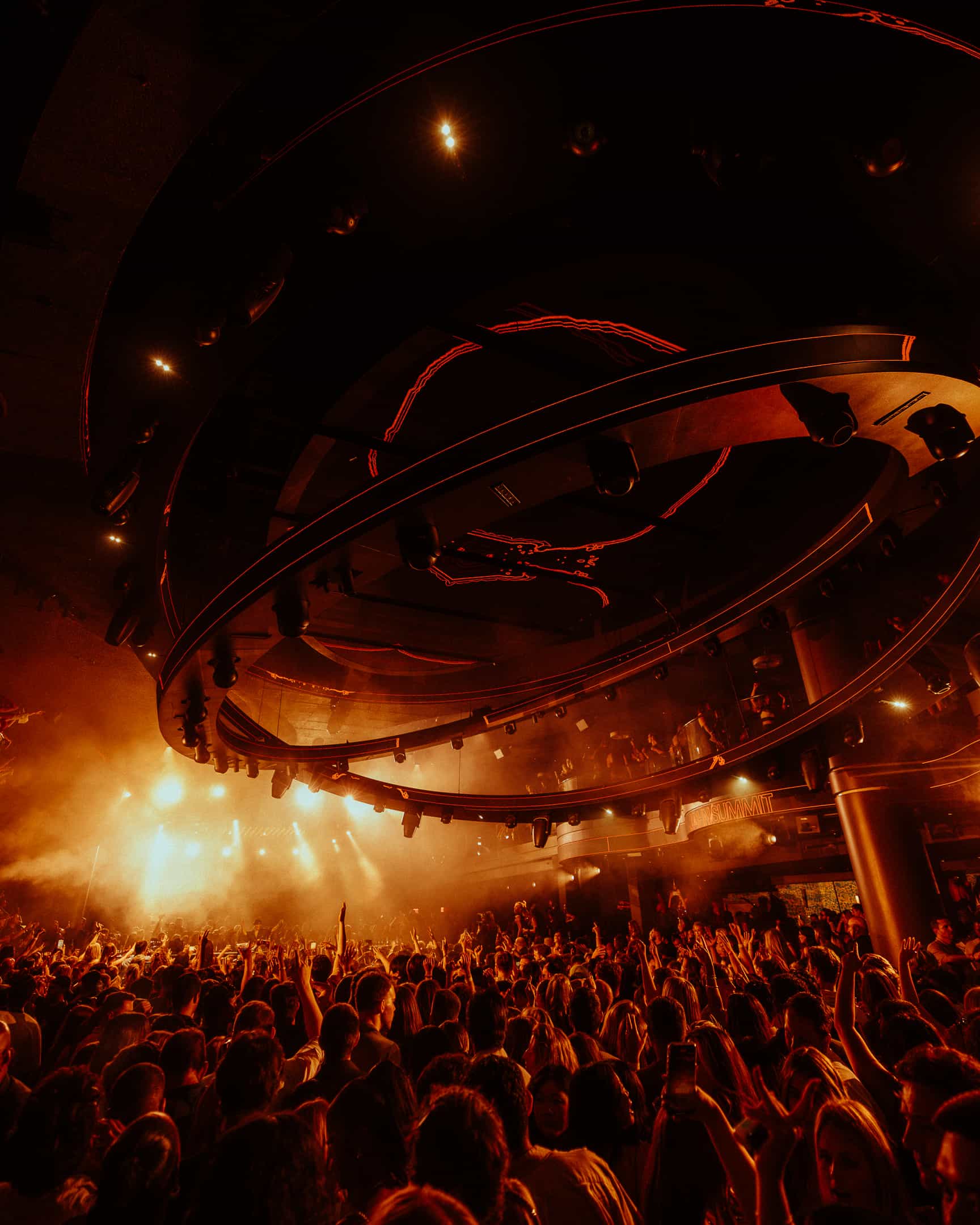 Wide crowd shot at LIV Las Vegas nightclub with immersive ceiling lighting and packed dancefloor atmosphere, photographed by A World Away