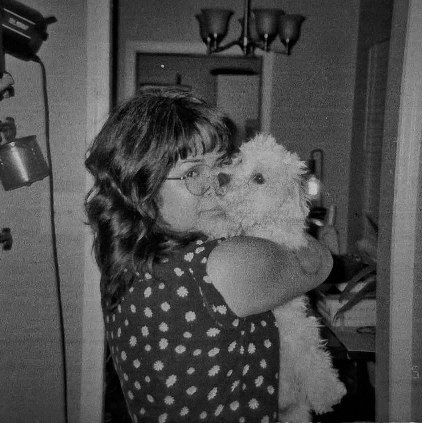 people in a large building with Tate Modern in the background