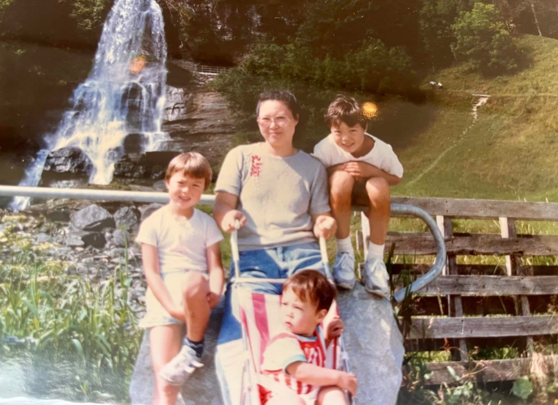 person sitting in a chair in front of a man