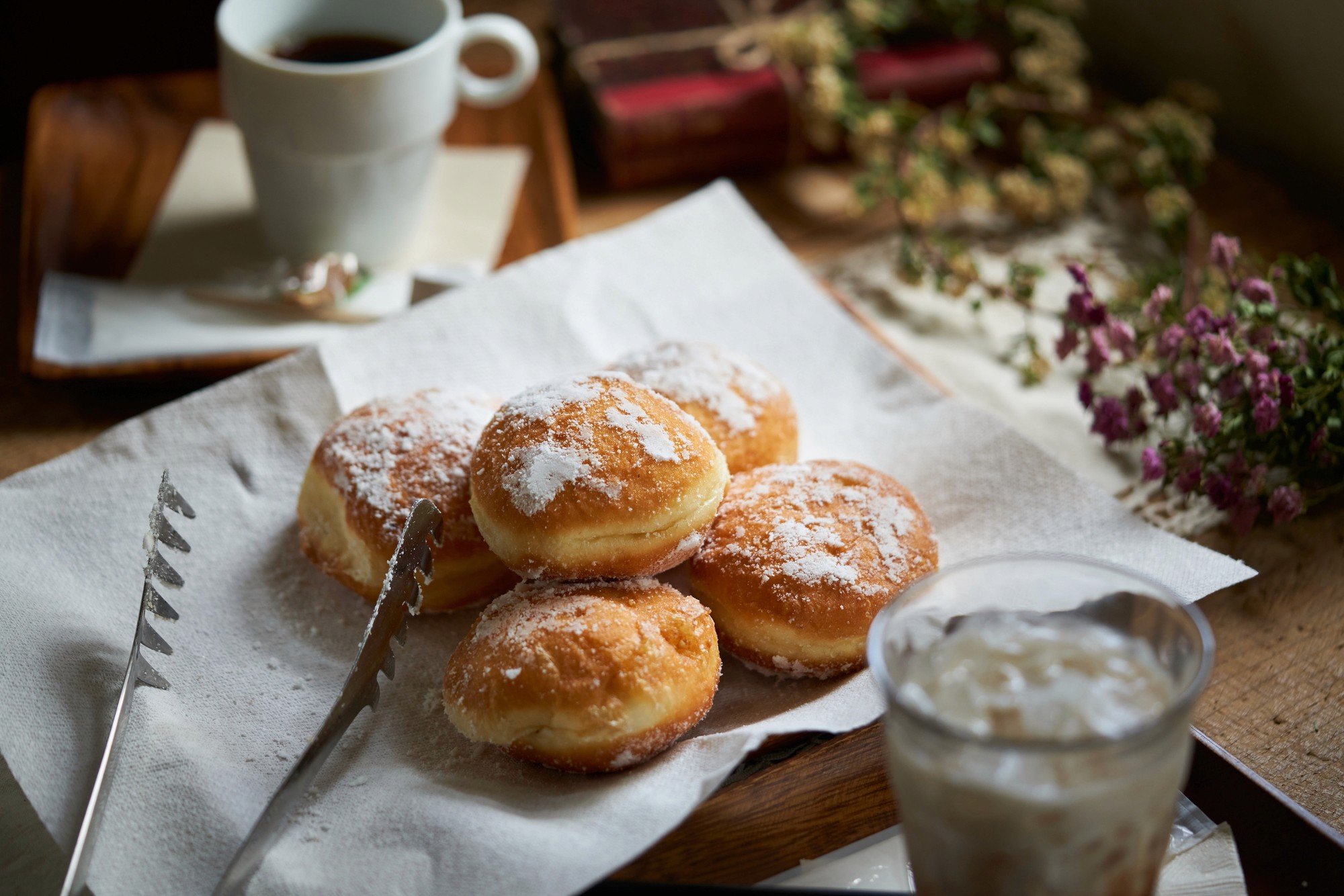 a person is holding a bowl of ice cream