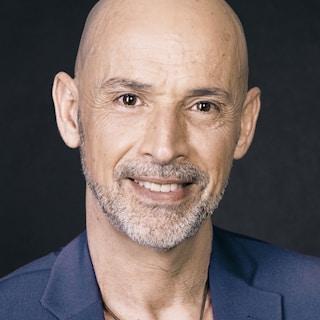 Business professional profile portrait: man in blue suit jacket