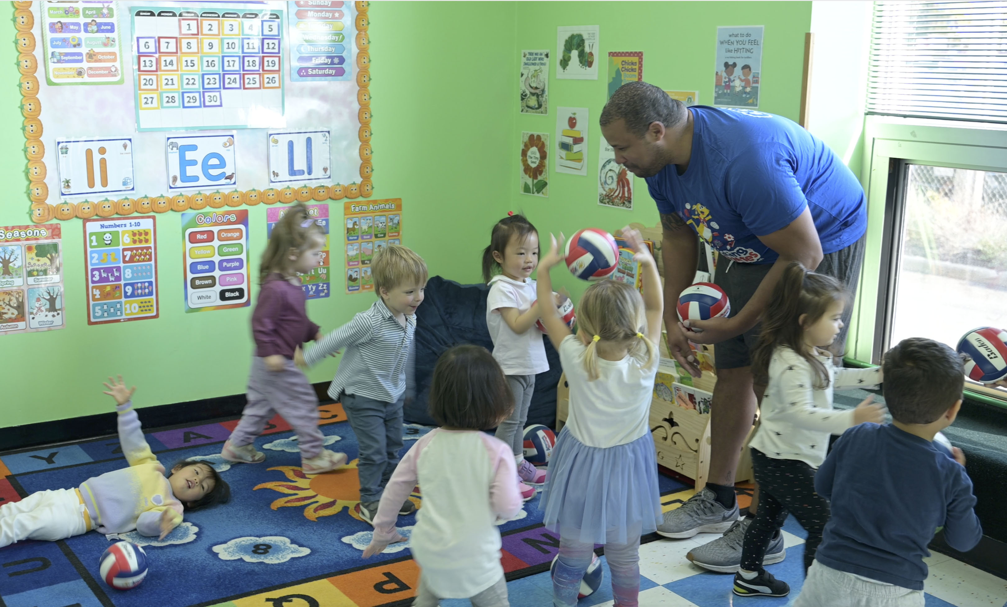 Early learners engaged in holistic development activities at Blooming Buds Learning Center in Syosset.