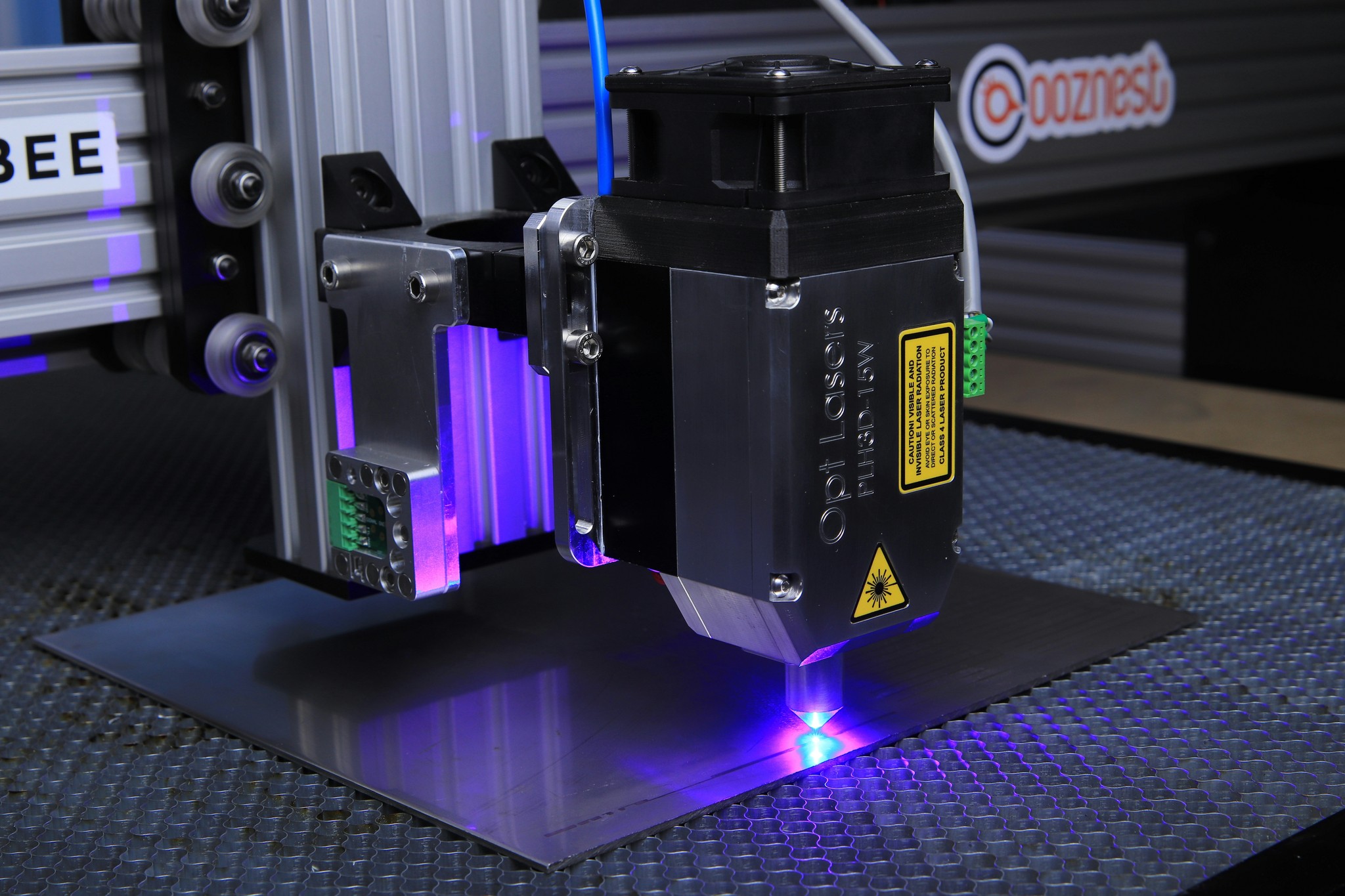 A high beam laser engraving machine engraving on a material