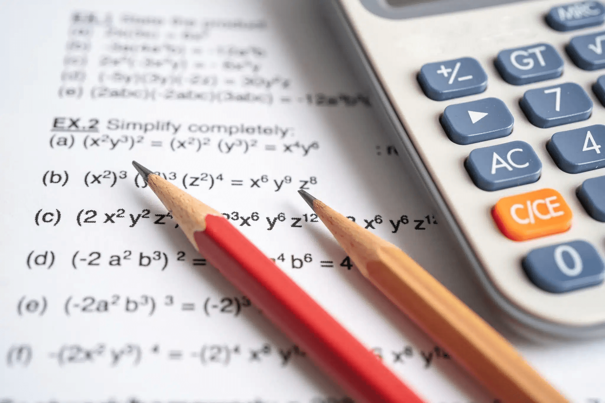 Maths exercises, two pencils and a calculator