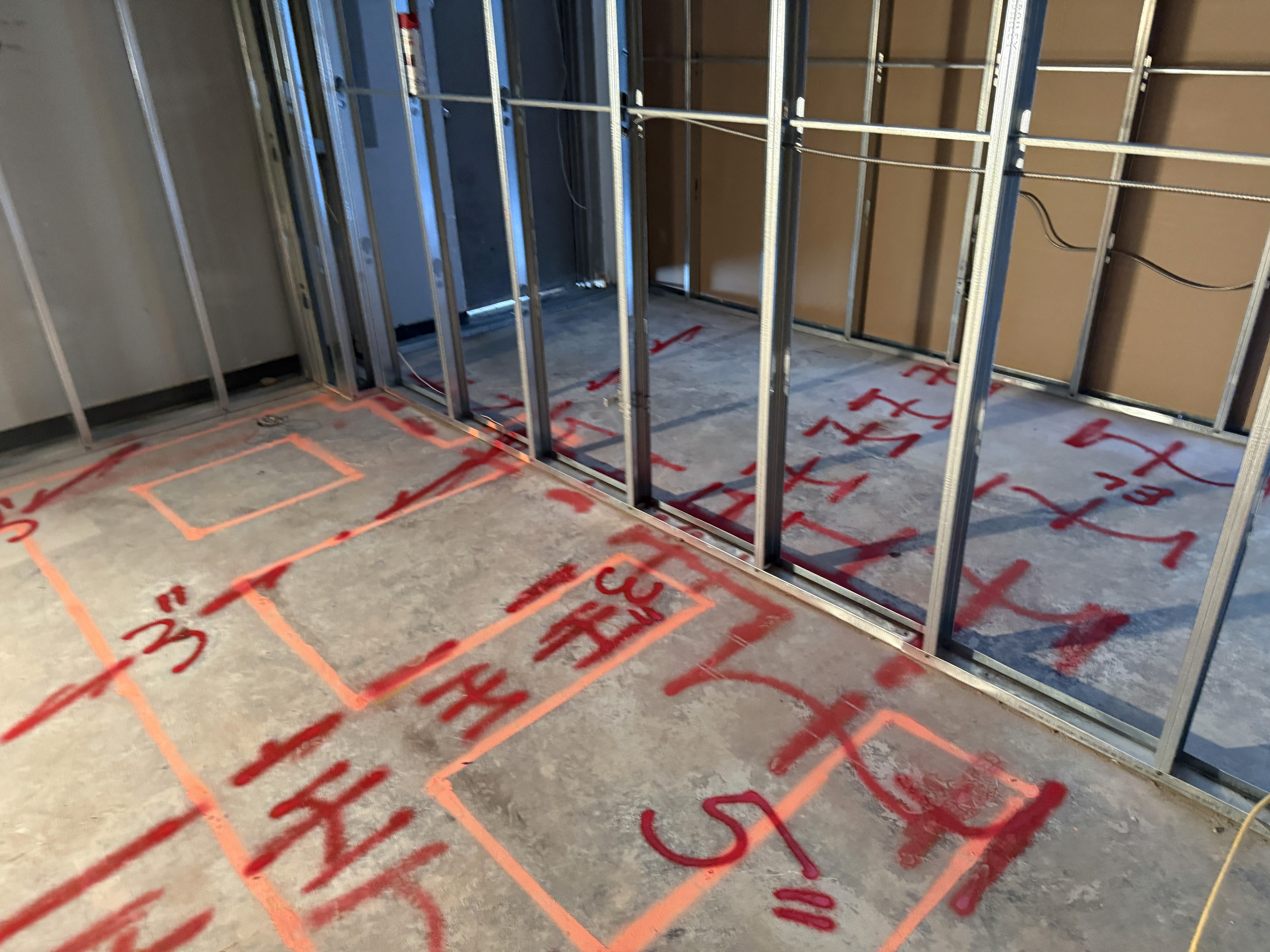 Group of people looking at a laptop