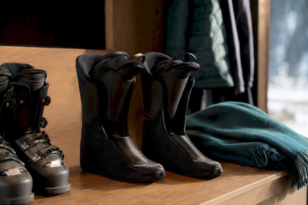 Removable ski boot liners drying indoors
