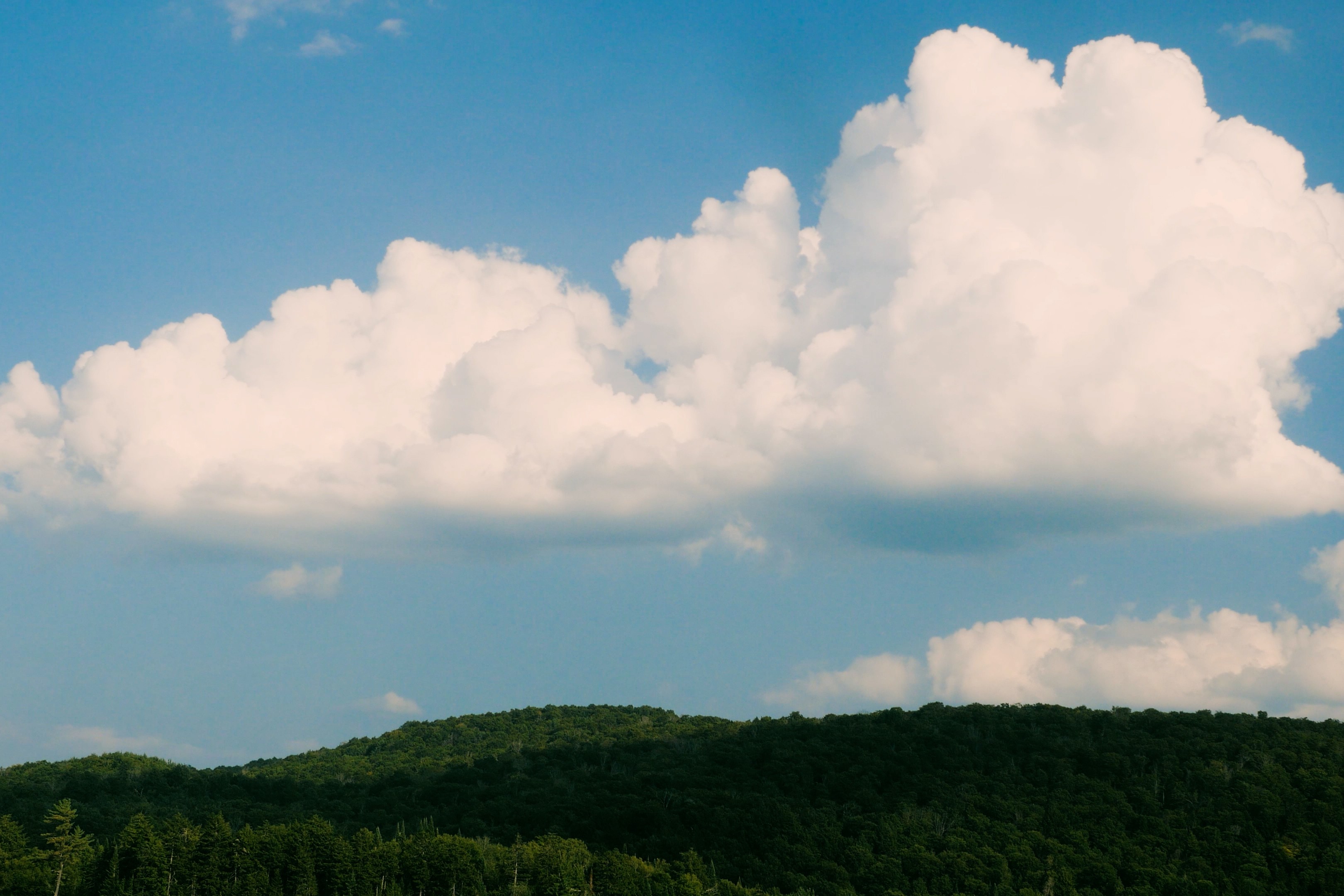 Cinematic landscape film capturing the sky and clouds over Laurentides, Quebec