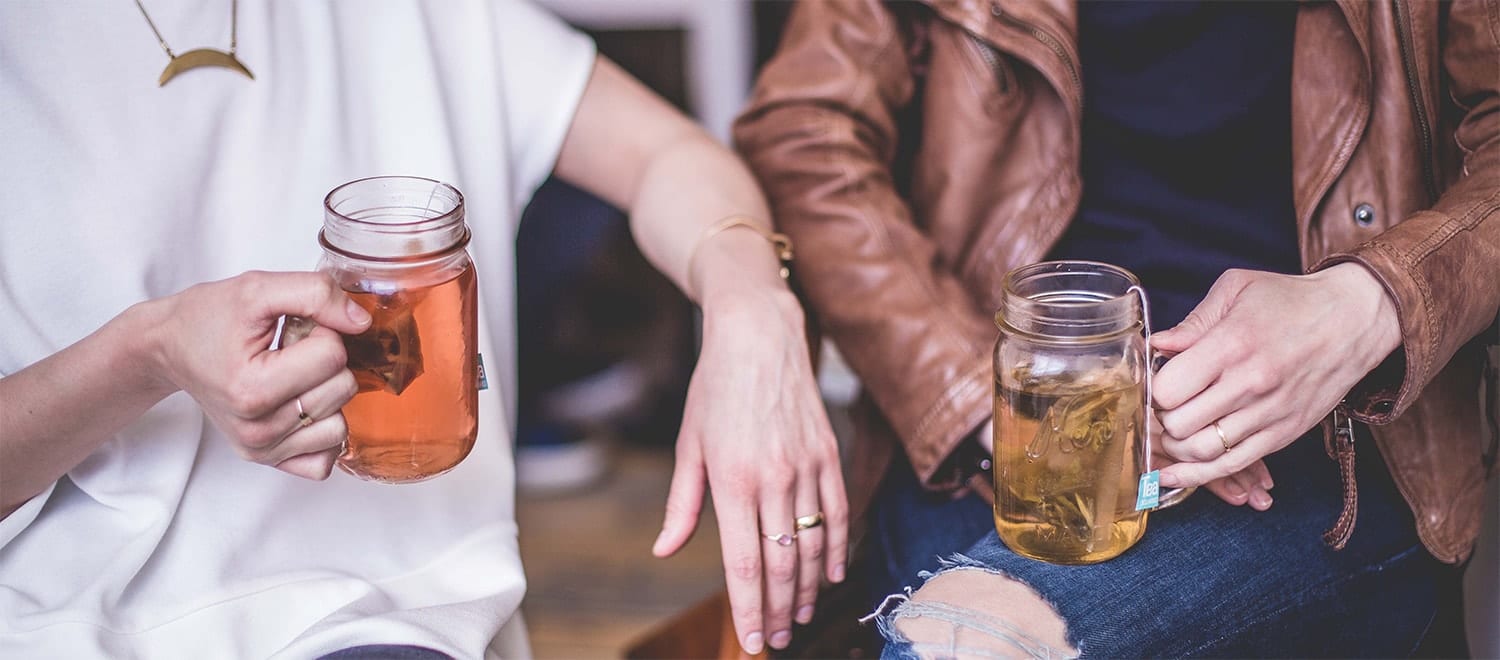 Two people meet for tea