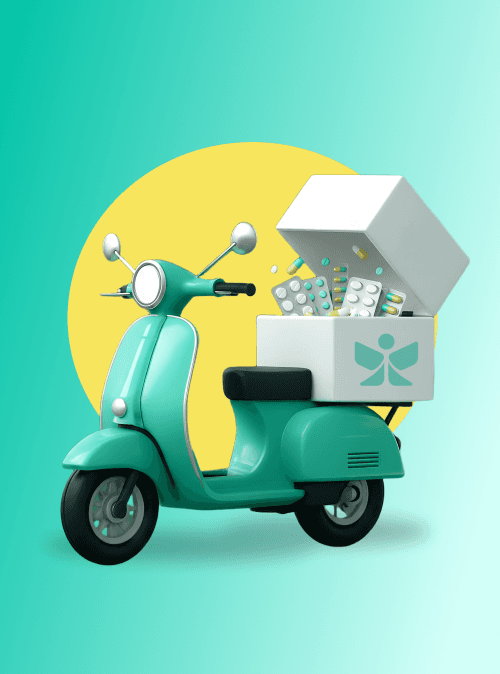 A smiling young man with crossed arms, wearing a plaid shirt and white t-shirt, poses against a dark background.