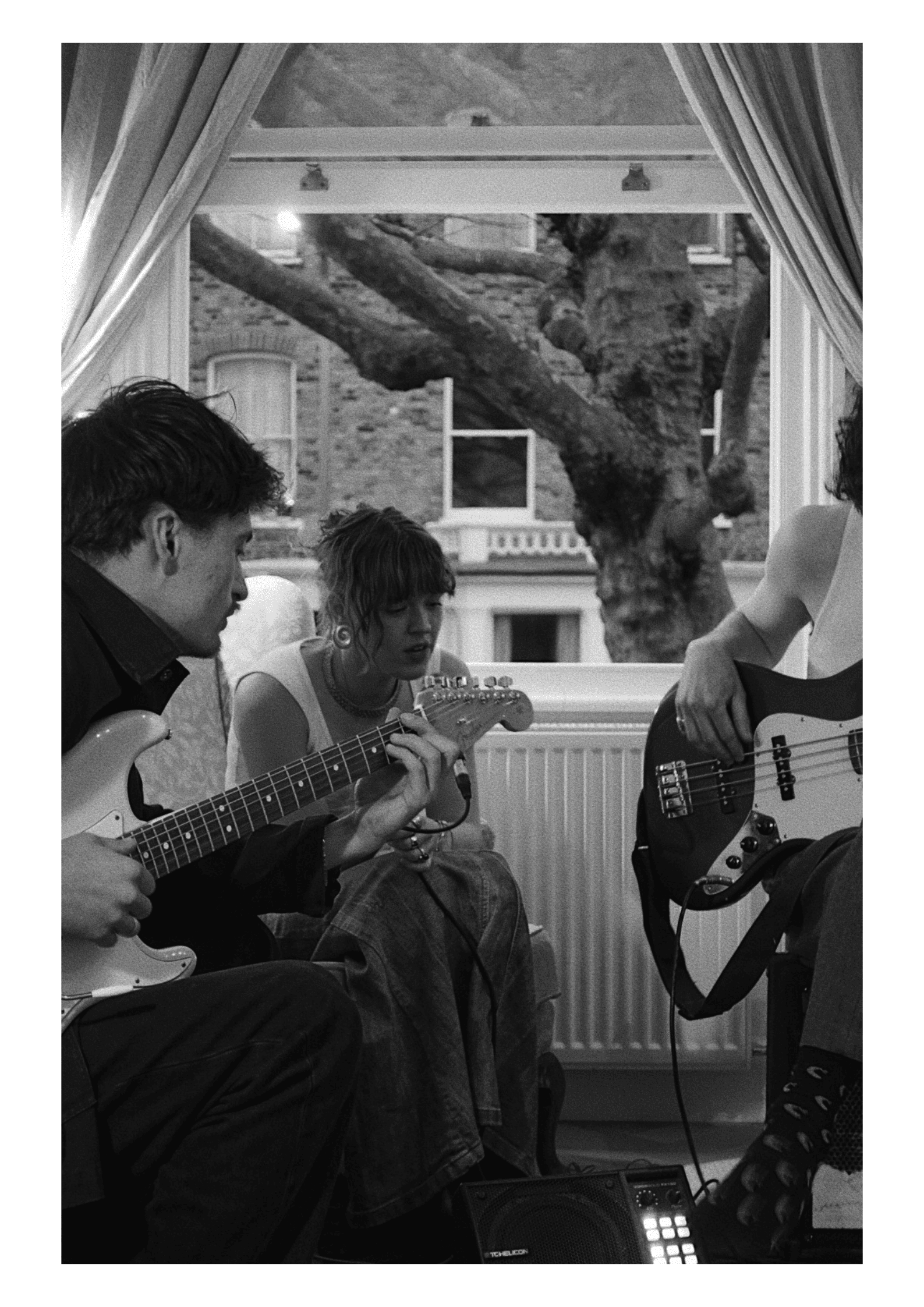 Singer performing live for social media content.