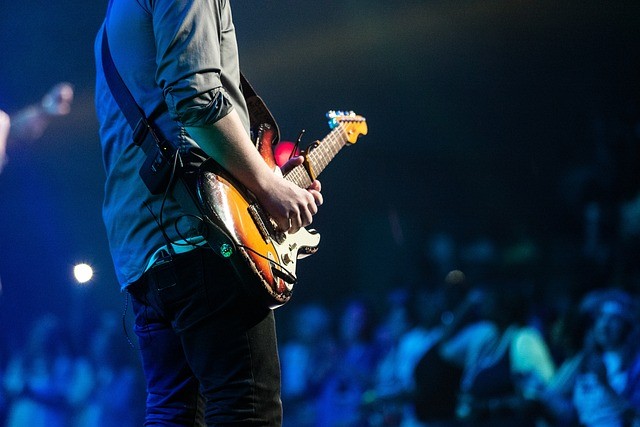 man playing guitar