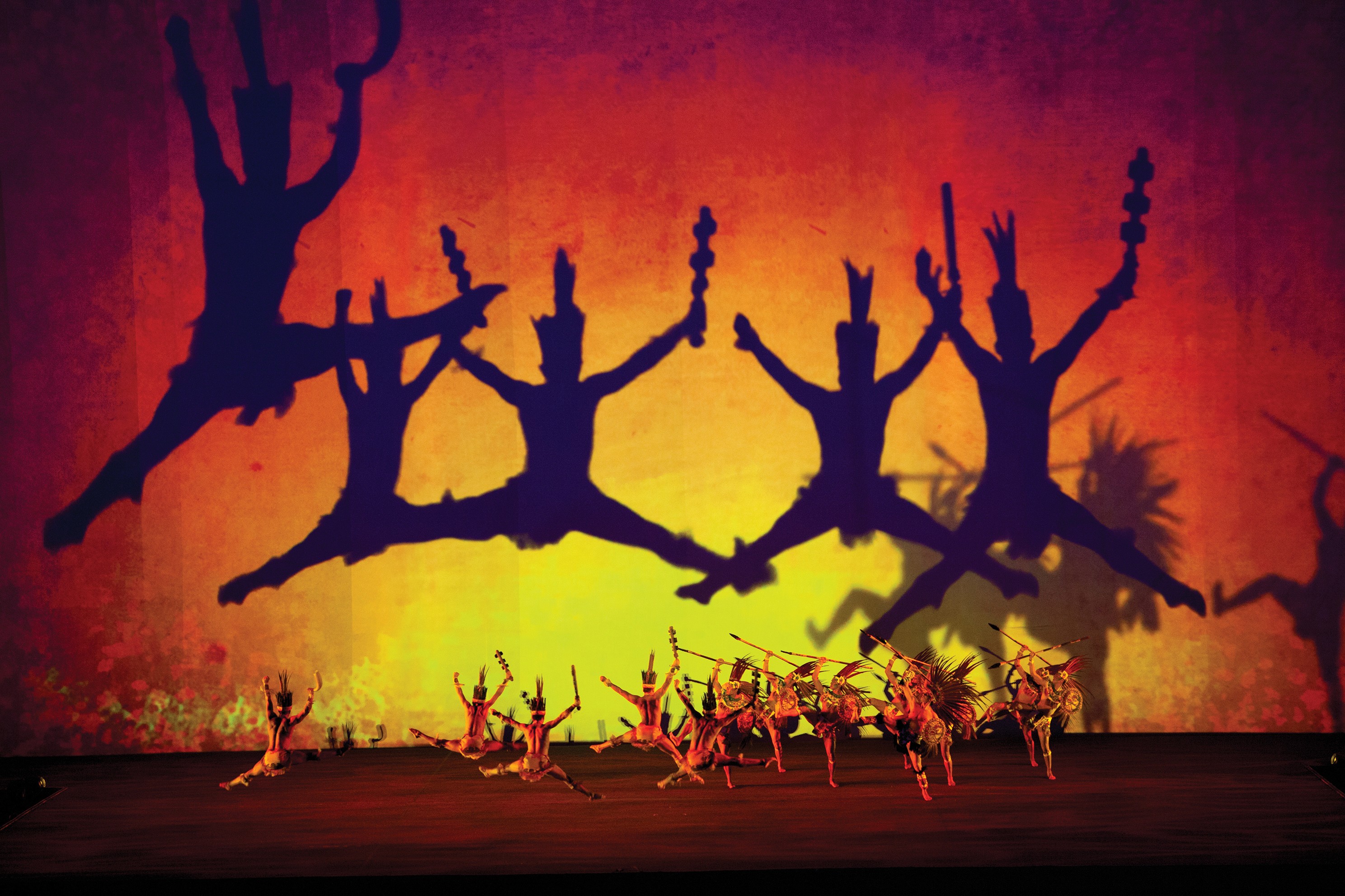 Performers create a cultural shadow dance at Cinco de Mayo 150th Celebration