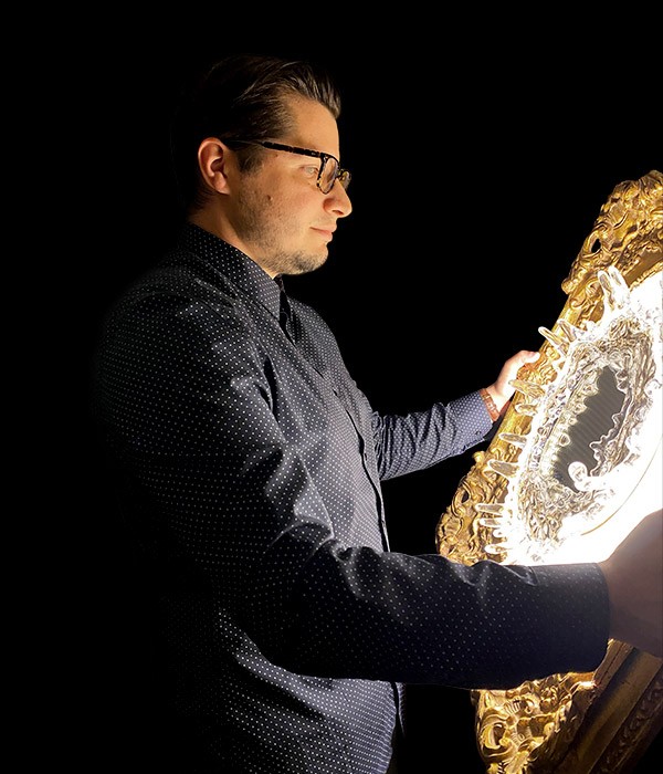 Portrait of Thomas Jackson holding 3d art